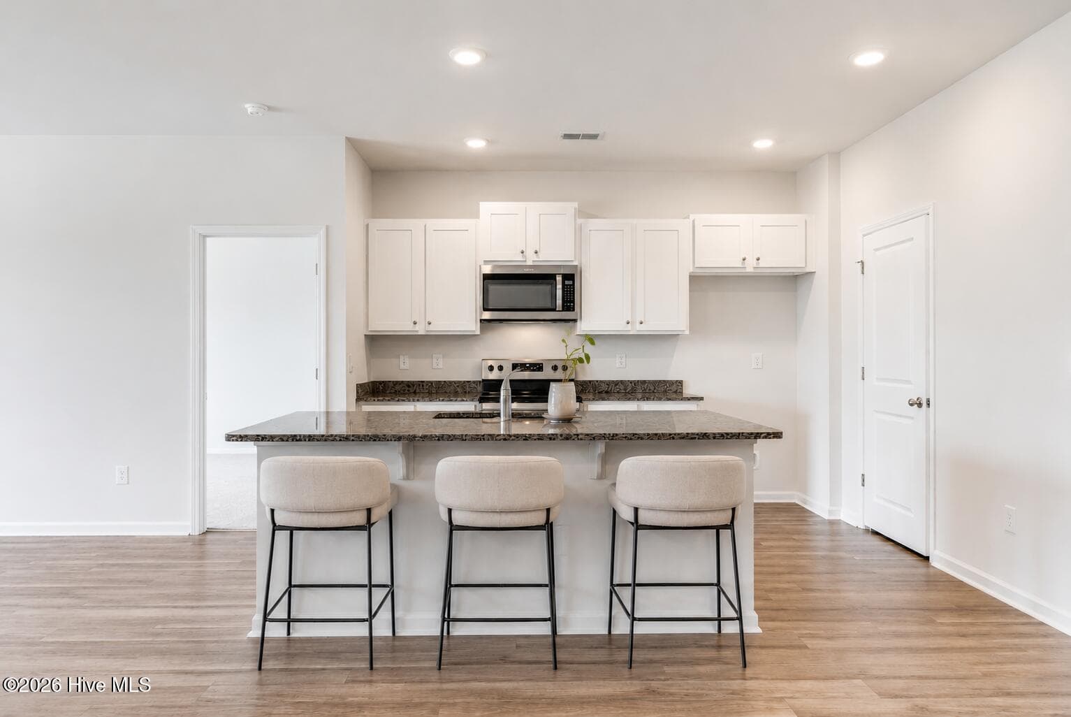 Virtually staged island - 1038 Burled Oak Ridge Loop SE, Bolivia, NC 28422