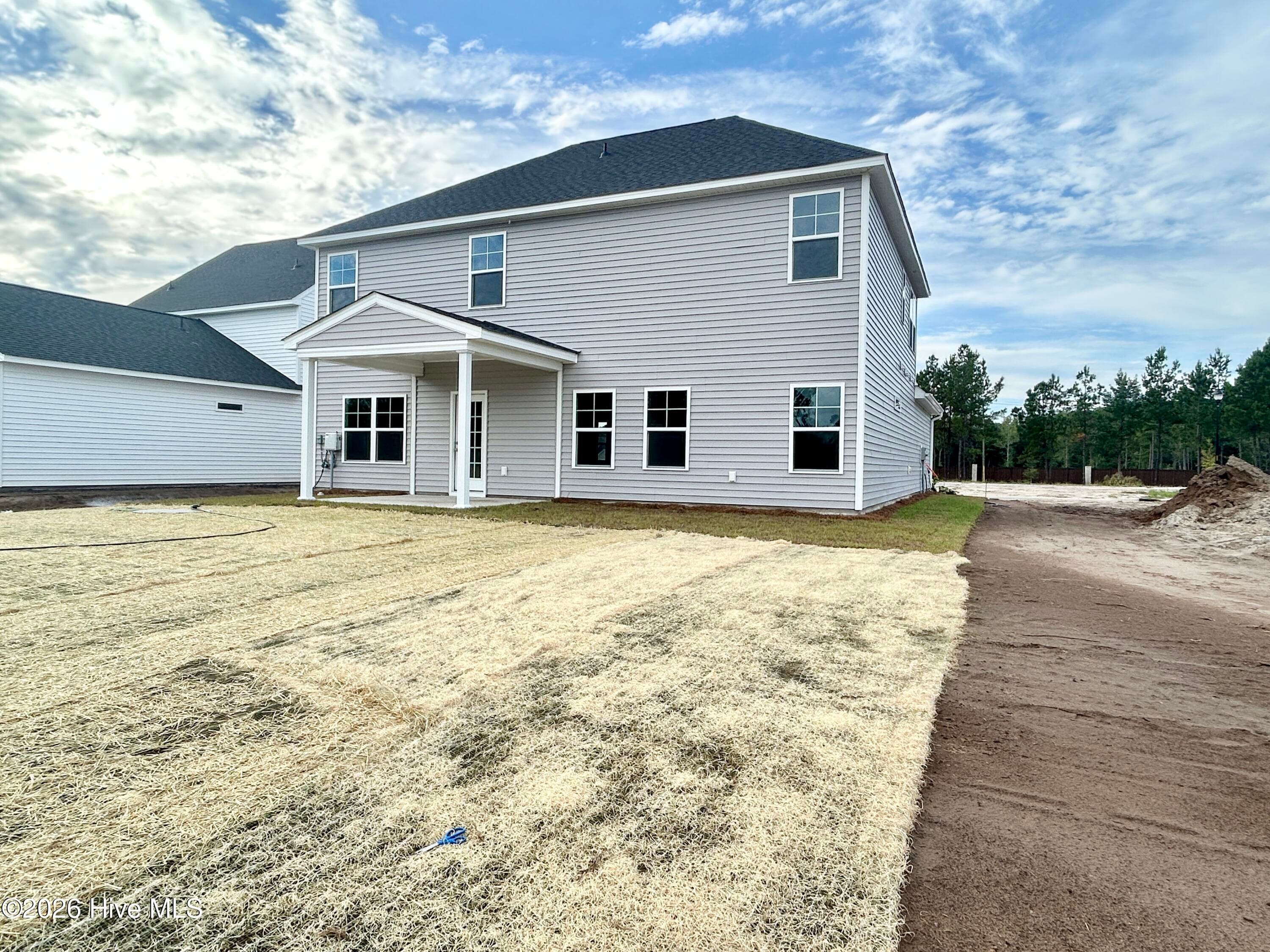 Home will feature a screened-in rear porch and full sod. - 4212 Workman Loop 95, Leland, NC 28451