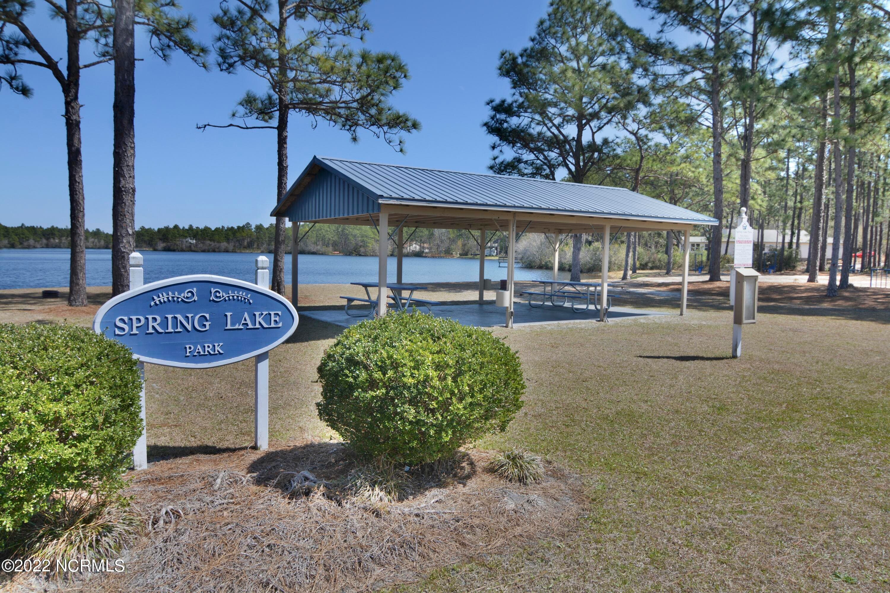 Spring Lake is close by for swimming, picnicking and relaxation. - 27 N High Point Road, Southport, NC 28461