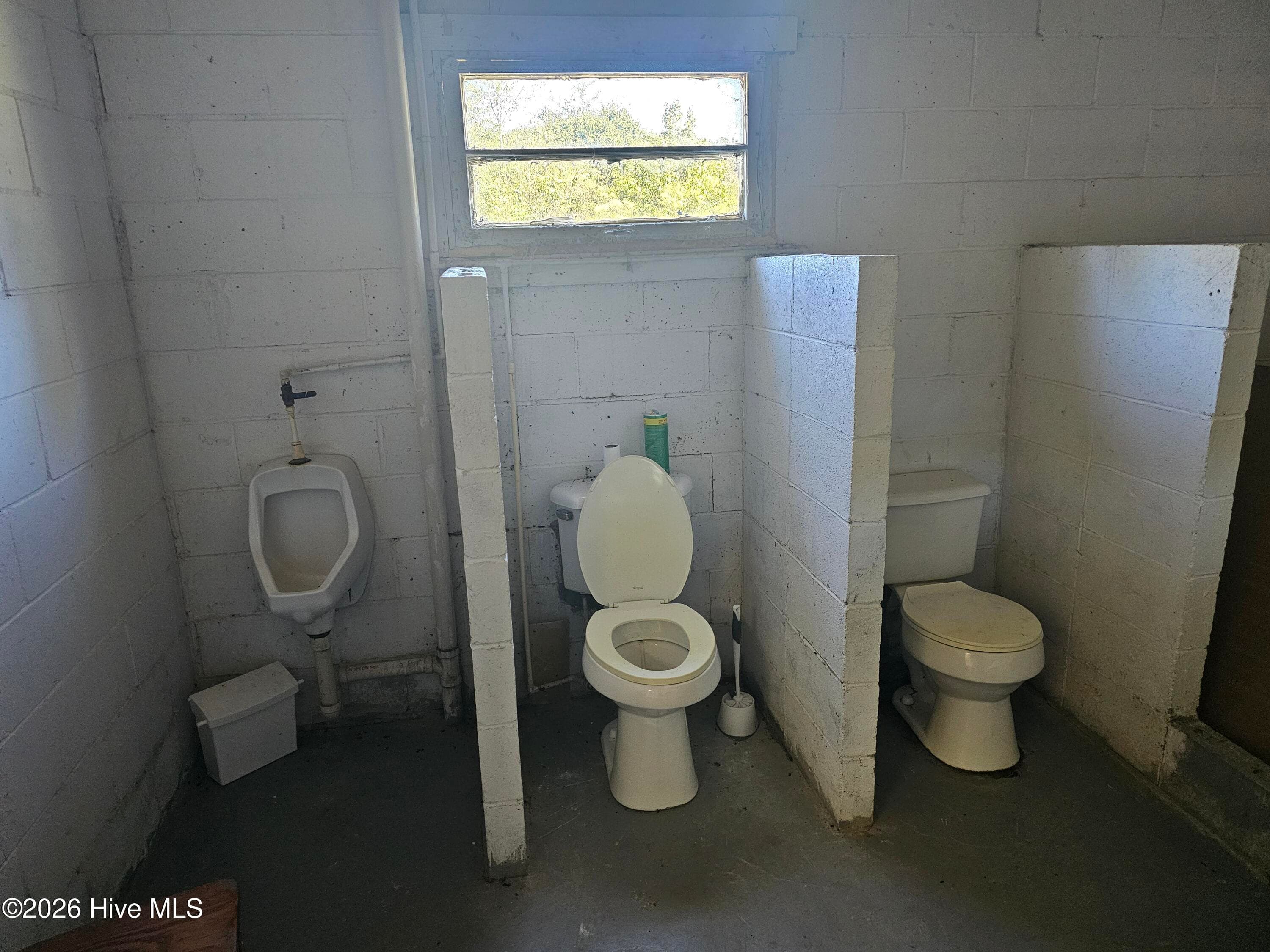 mens bathroom - 25 NE Holmes Pond Road, Johnston, SC 29832