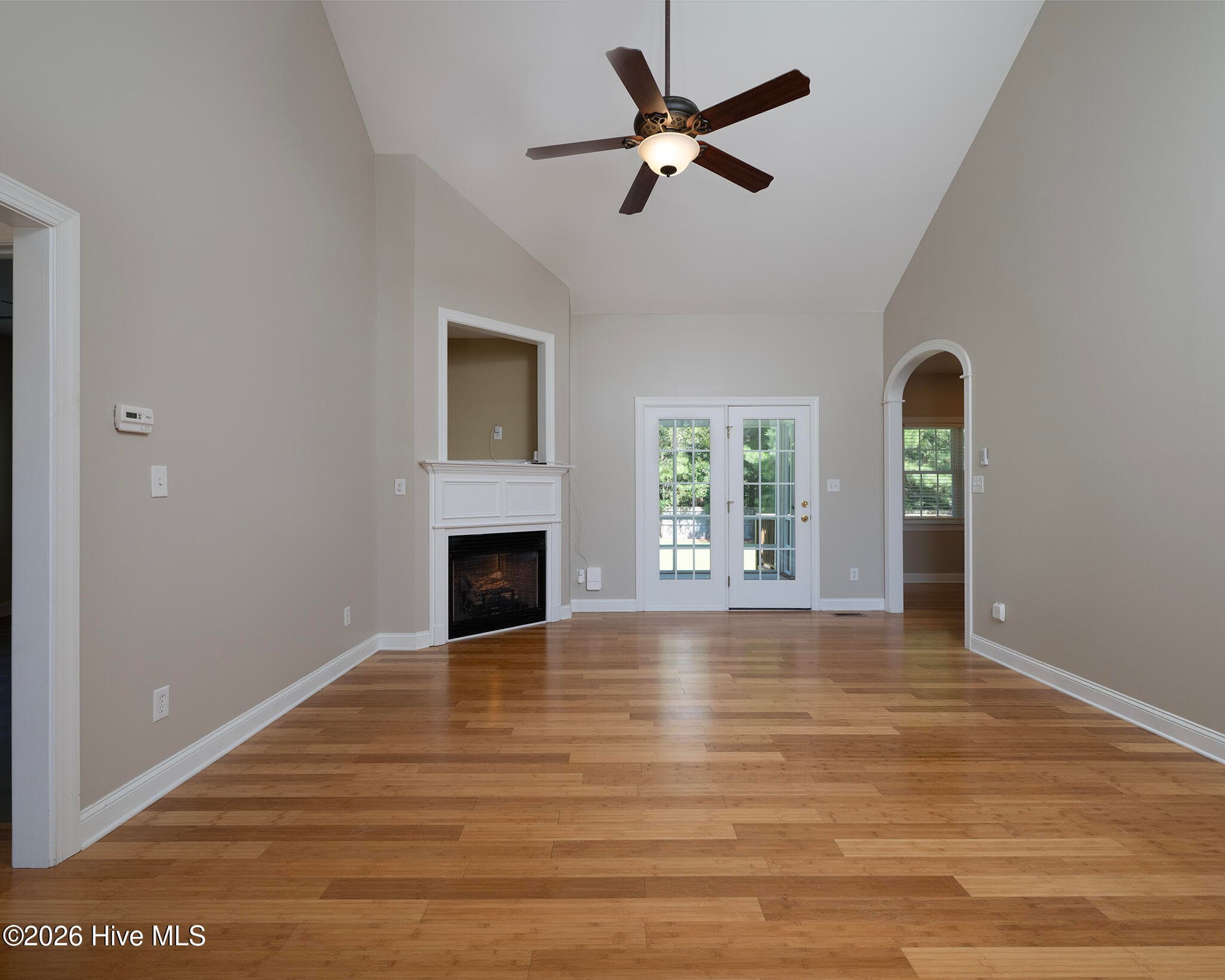 Living Room with Vaulted Ceiling and Cozy Corner Fireplace - 168 Laura Drive, New Bern, NC 28562