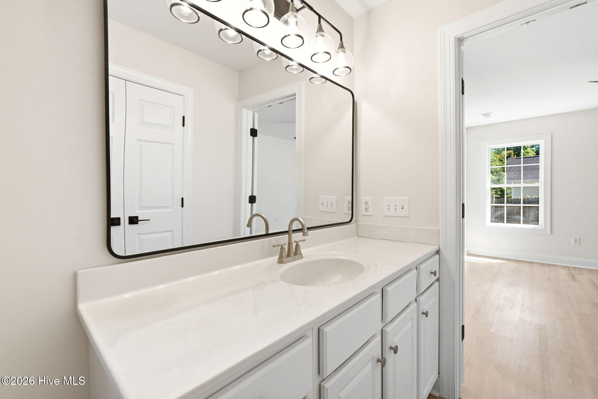Master Bathroom looking into the Master Bedroom - 215 Gardenview Court NE, Leland, NC 28451