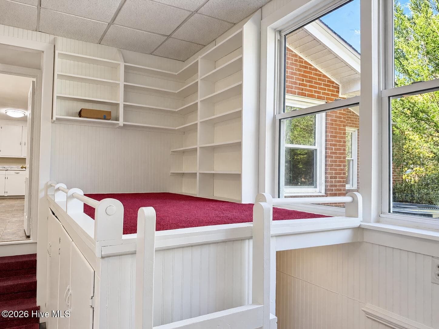 Loft and shelving above stairs to basement. - 320 Northern Boulevard, Wilmington, NC 28401