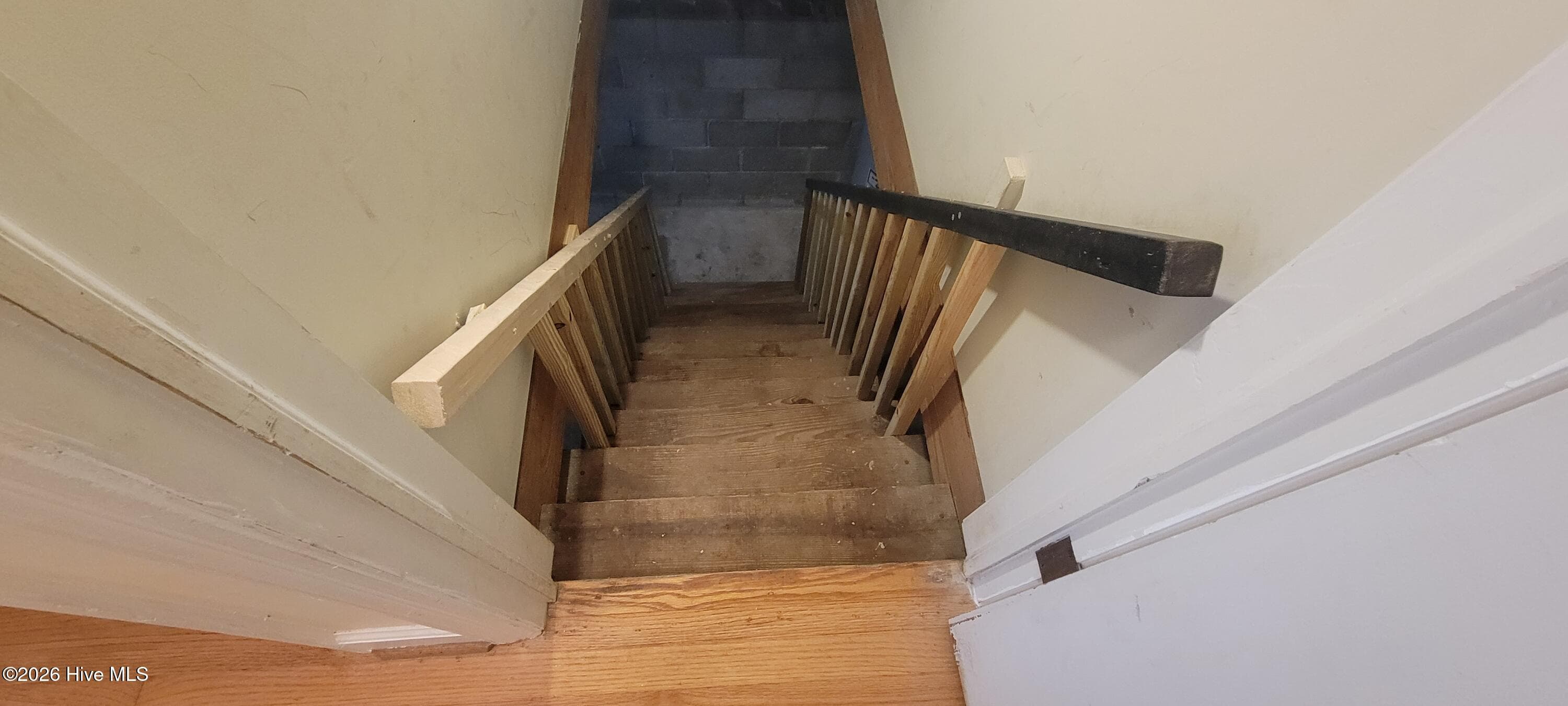 New basement handrails and spindles leading from the interior hallway - 110 Landon Drive, Washington, NC 27889