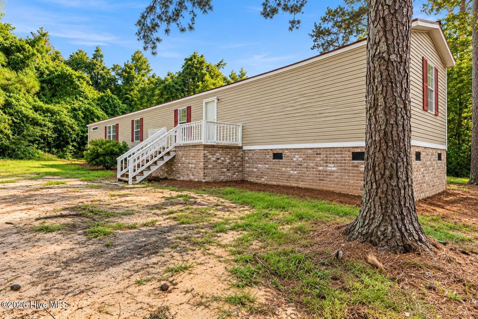 Manufactured Home at 1216 Roberdel Road, Rockingham, NC 28379, photo 2 of 24
