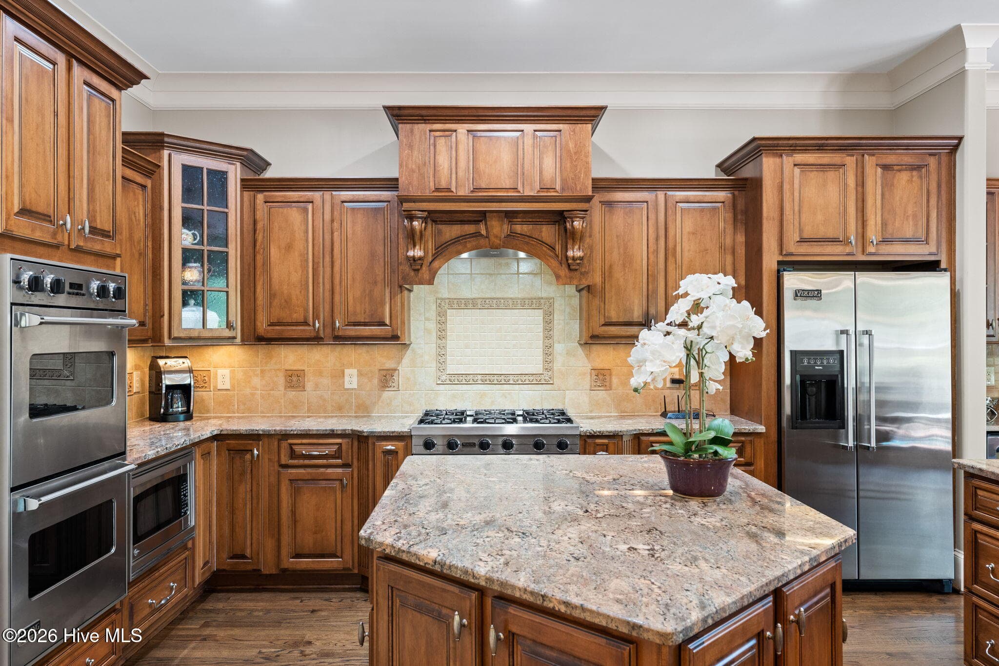 Kitchen has center island for prep and storage. - 3858 Ridge Crest Drive, Southport, NC 28461