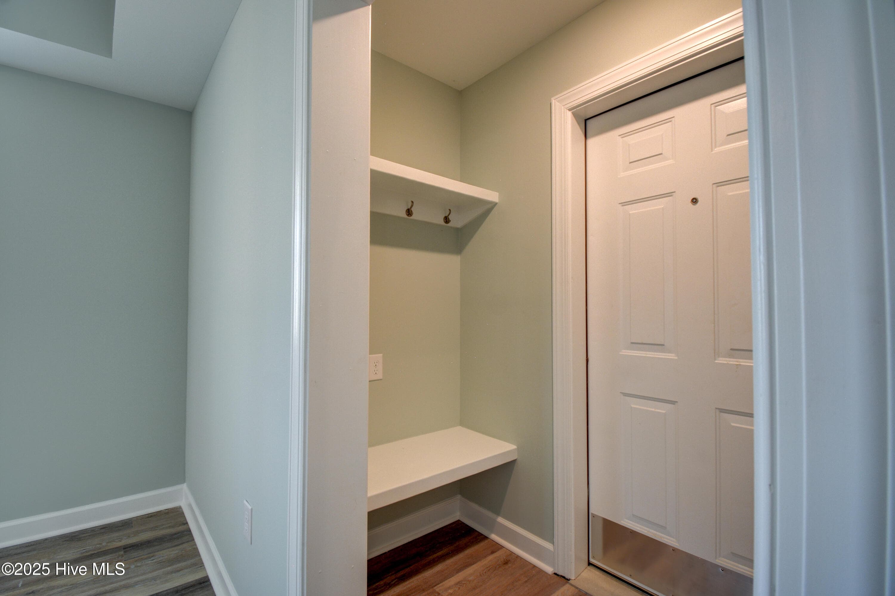Entry mudroom between downstairs family room and garage - 320 Belt Road, Hampstead, NC 28443
