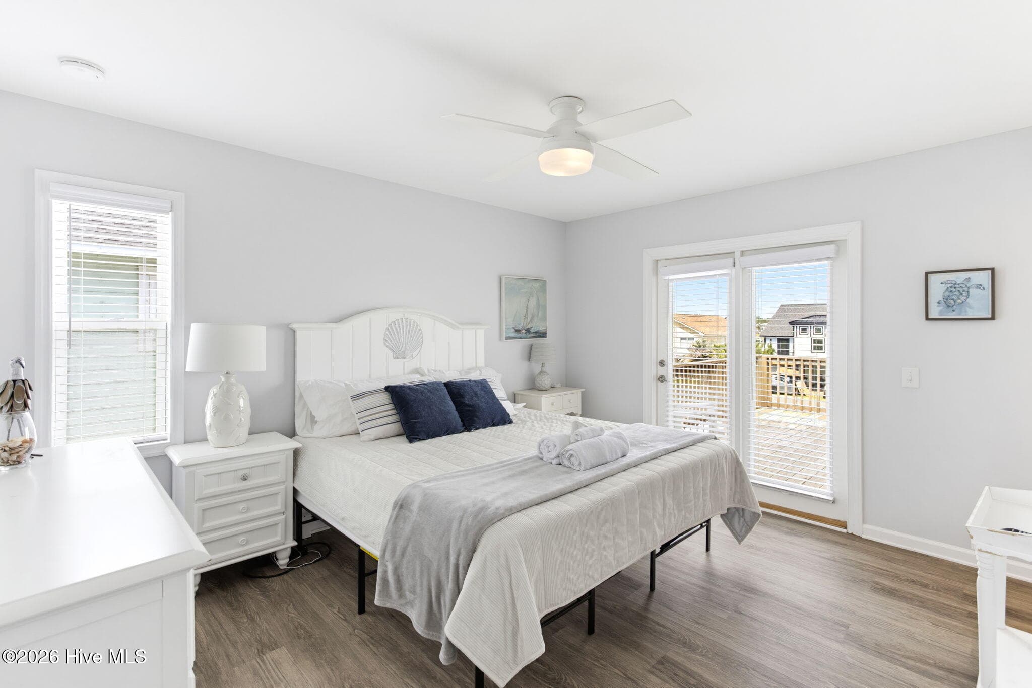 Primary bedroom with deck access - 2330 W Beach Drive, Oak Island, NC 28465