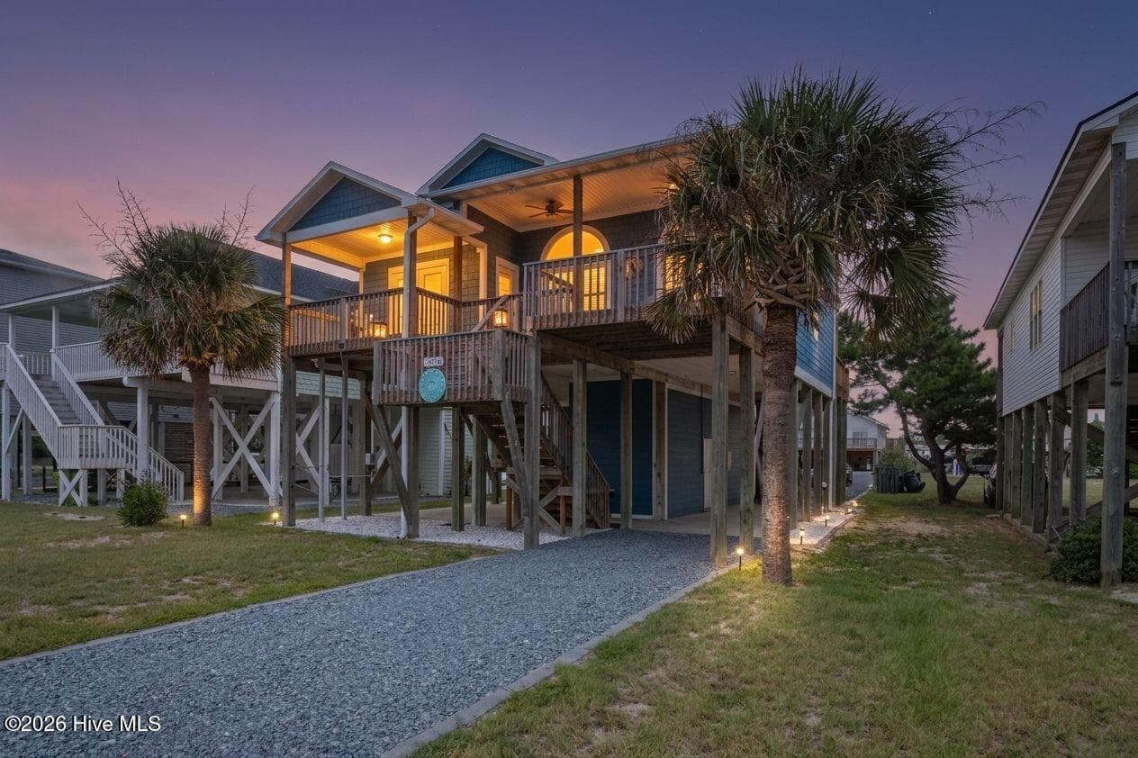 Front exterior at dusk - 2330 W Beach Drive, Oak Island, NC 28465