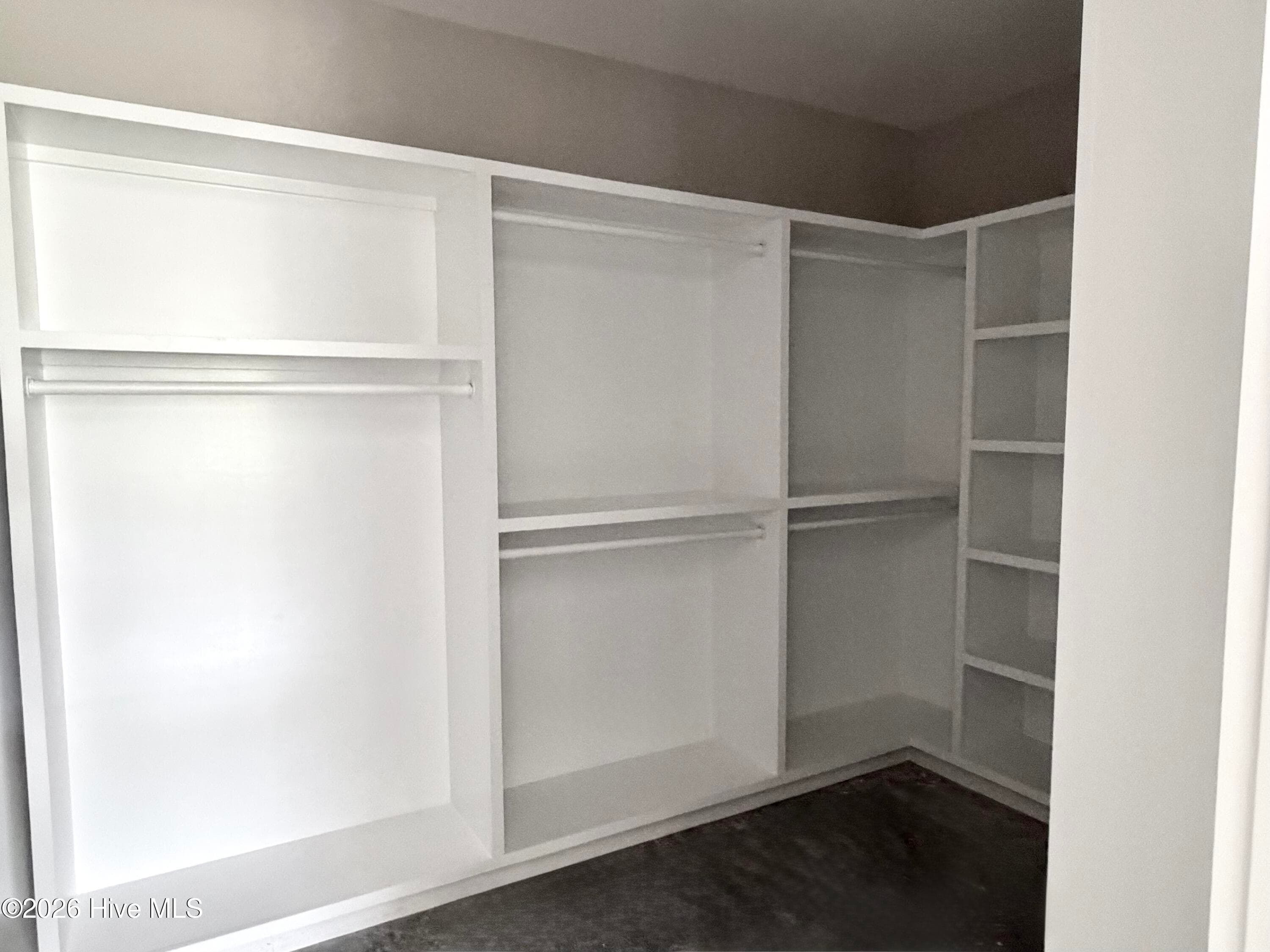 Primary walk in closet. - 550 Glenburnie Street NW, Calabash, NC 28467