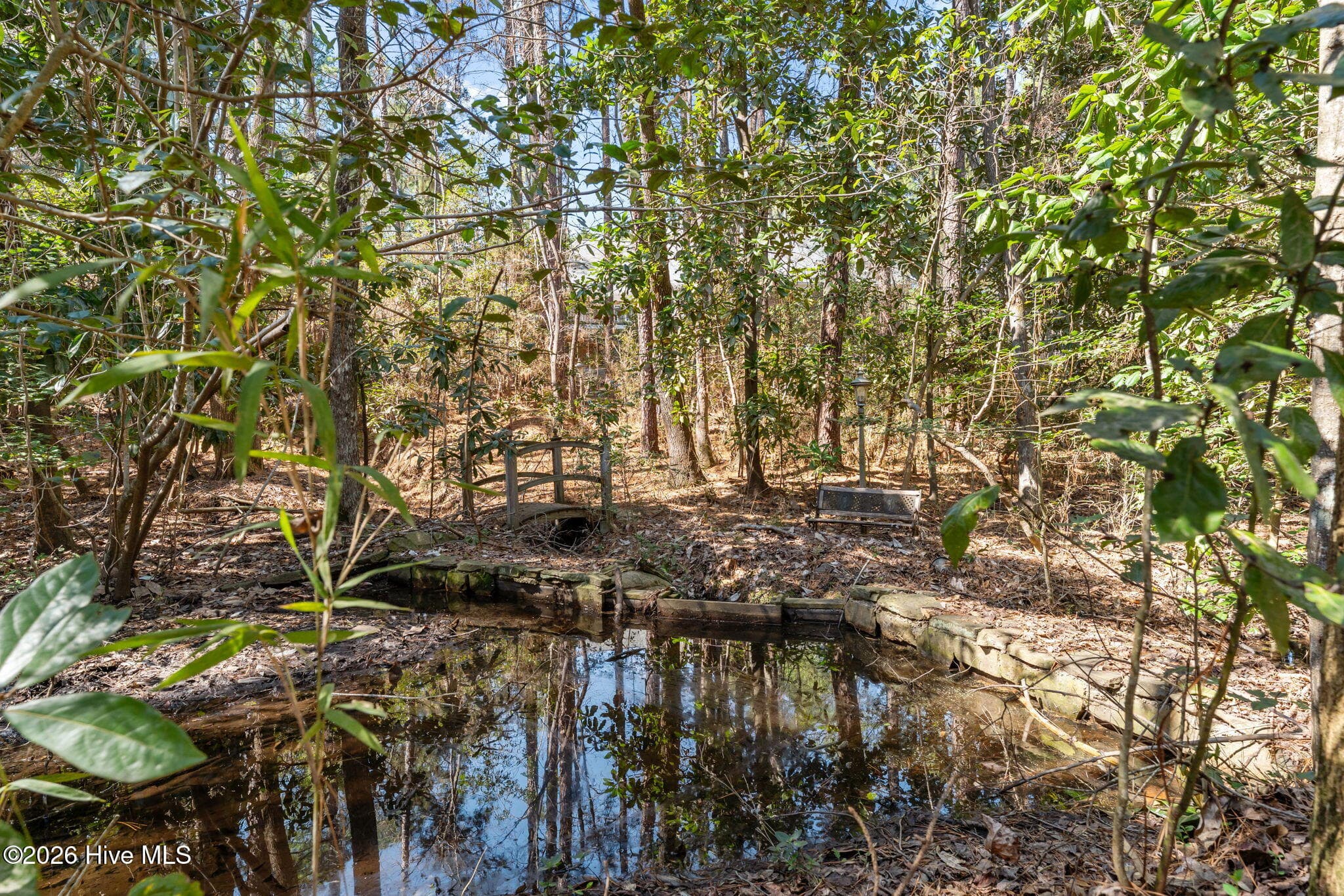 The babbling brook/stream to relax and enjoy the beauty that abounds. - 22 Lochmere Drive, Pinehurst, NC 28374