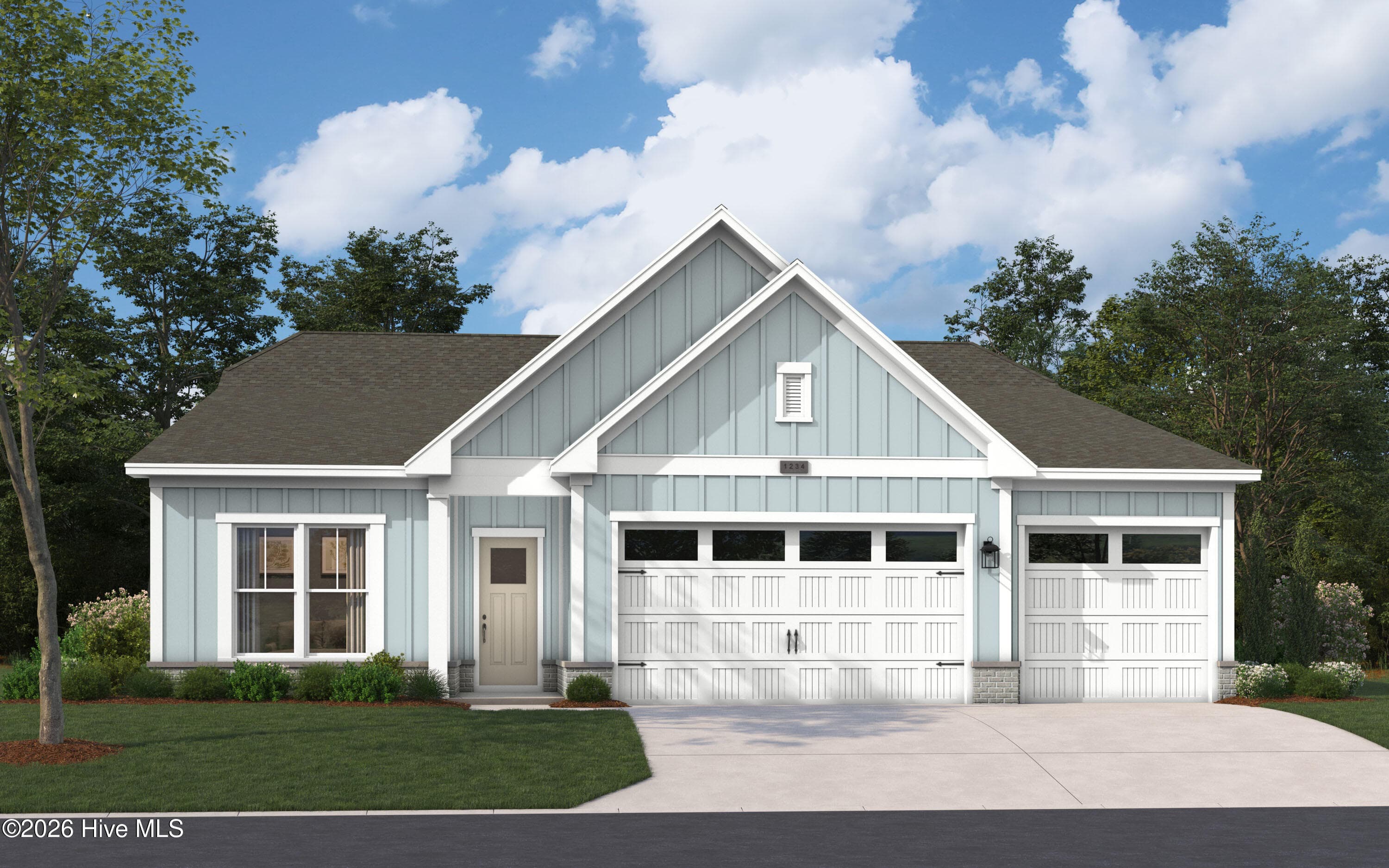 To show how the Garage doors will look once the sales office is converted. - 131 Stuart Avenue 42, Southport, NC 28461