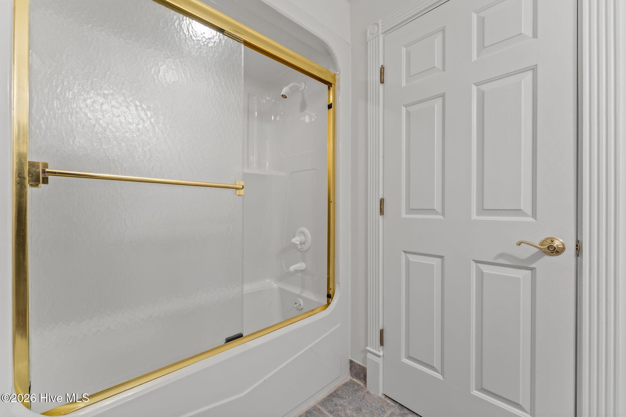 Lower level bathroom shower and tub. - 22 Lochmere Drive, Pinehurst, NC 28374