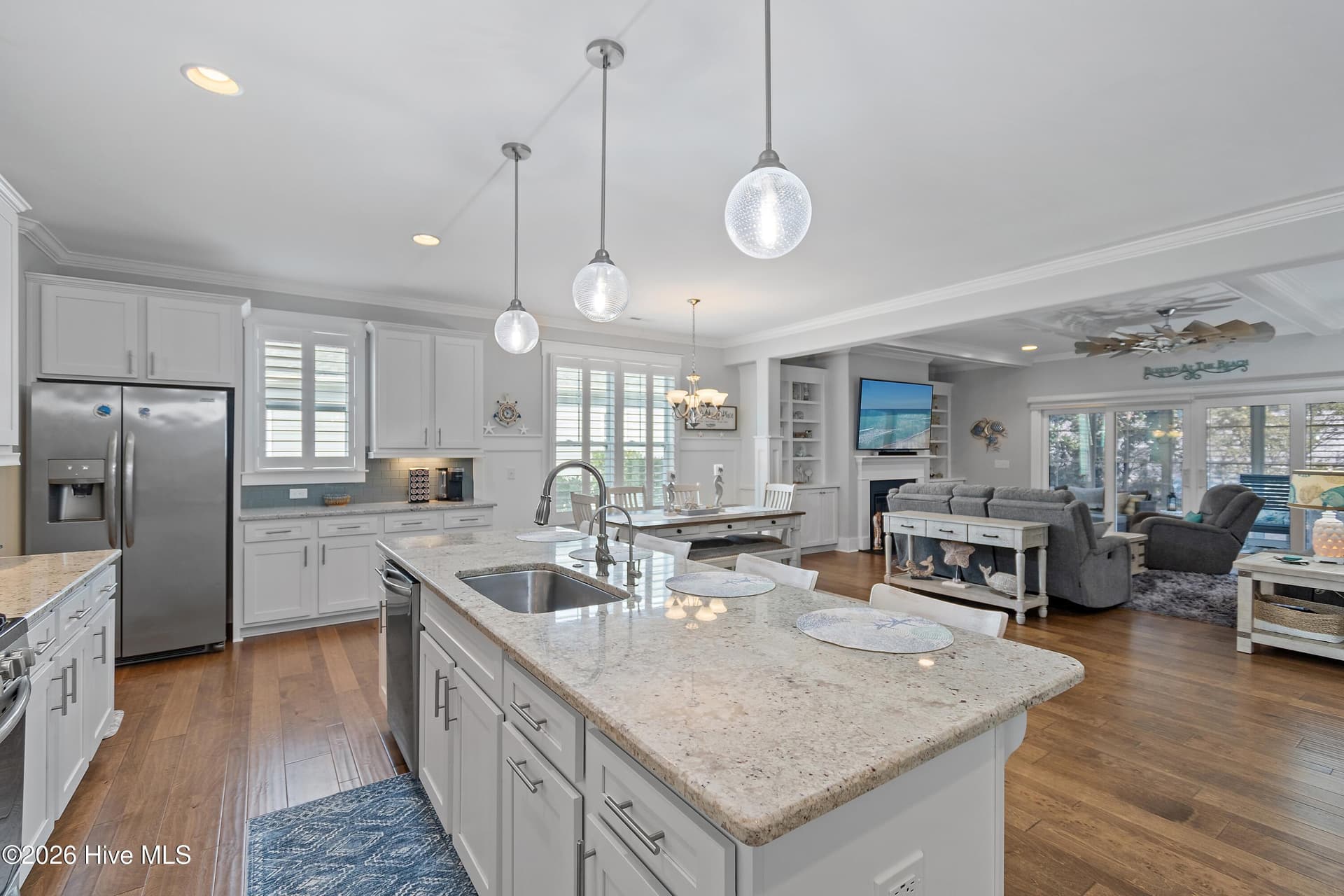 Beautiful hardwood flooring, tons of cabinet space and coastal accents. - 6358 Bryson Drive SW, Ocean Isle Beach, NC 28469