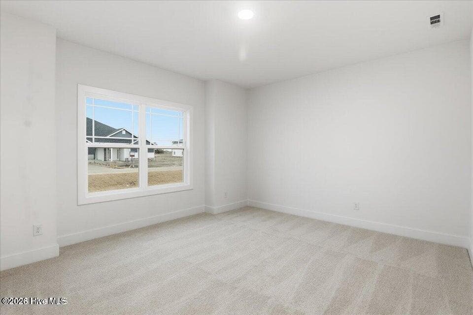 2604 Representative Photo. Bedroom 2 at front of home - 2121 Sandbrook Loop, Leland, NC 28451
