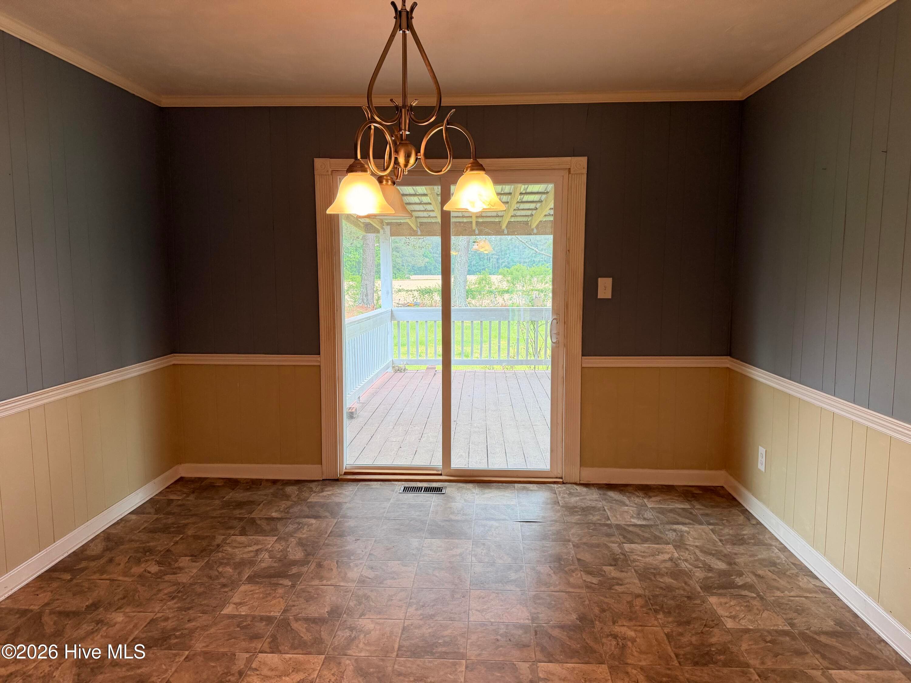 dining room adjacent to back porch - 236 Brinkleyville Road, Ahoskie, NC 27910