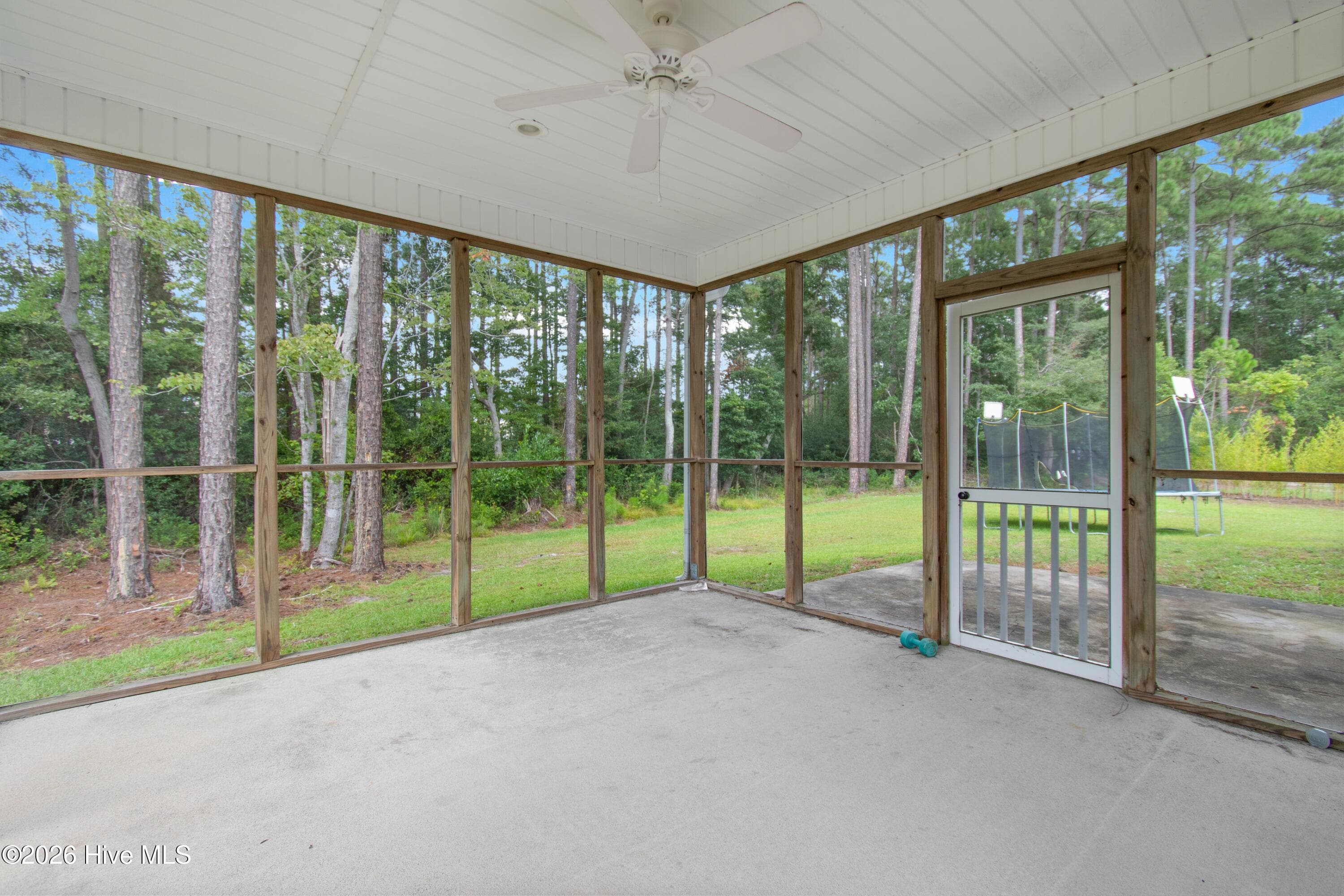 Large screened porch accessible from breakfast nook/kitchen and promary bedroom. - 709 E Pipers Glen, Shallotte, NC 28470