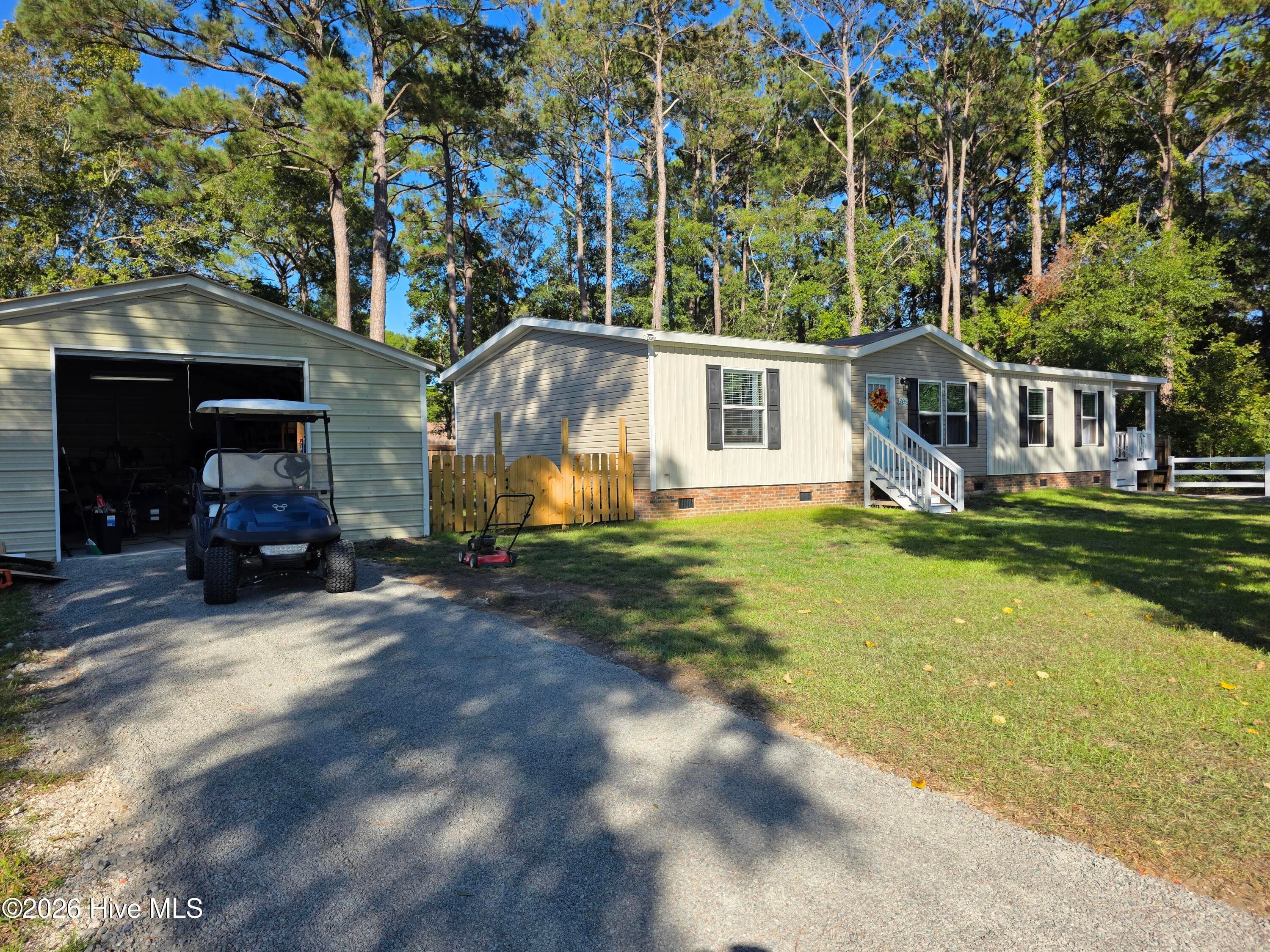 Manufactured Home at 3459 Lakeview Drive SW, Supply, NC 28462, photo 5 of 70