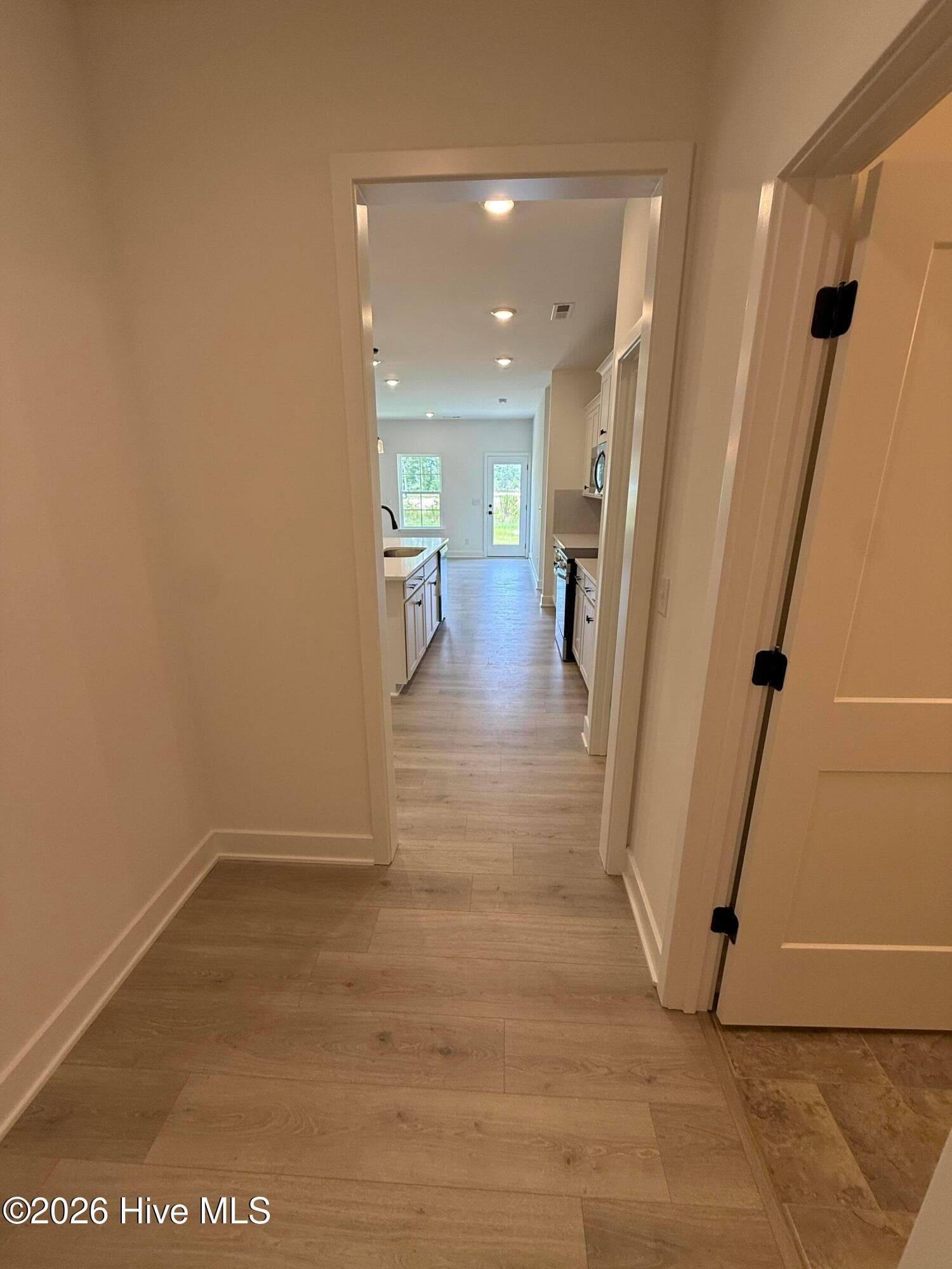 Representative photo Drop zone between Garage and kitchen with half bath - 2129 Sandbrook Loop, Leland, NC 28451