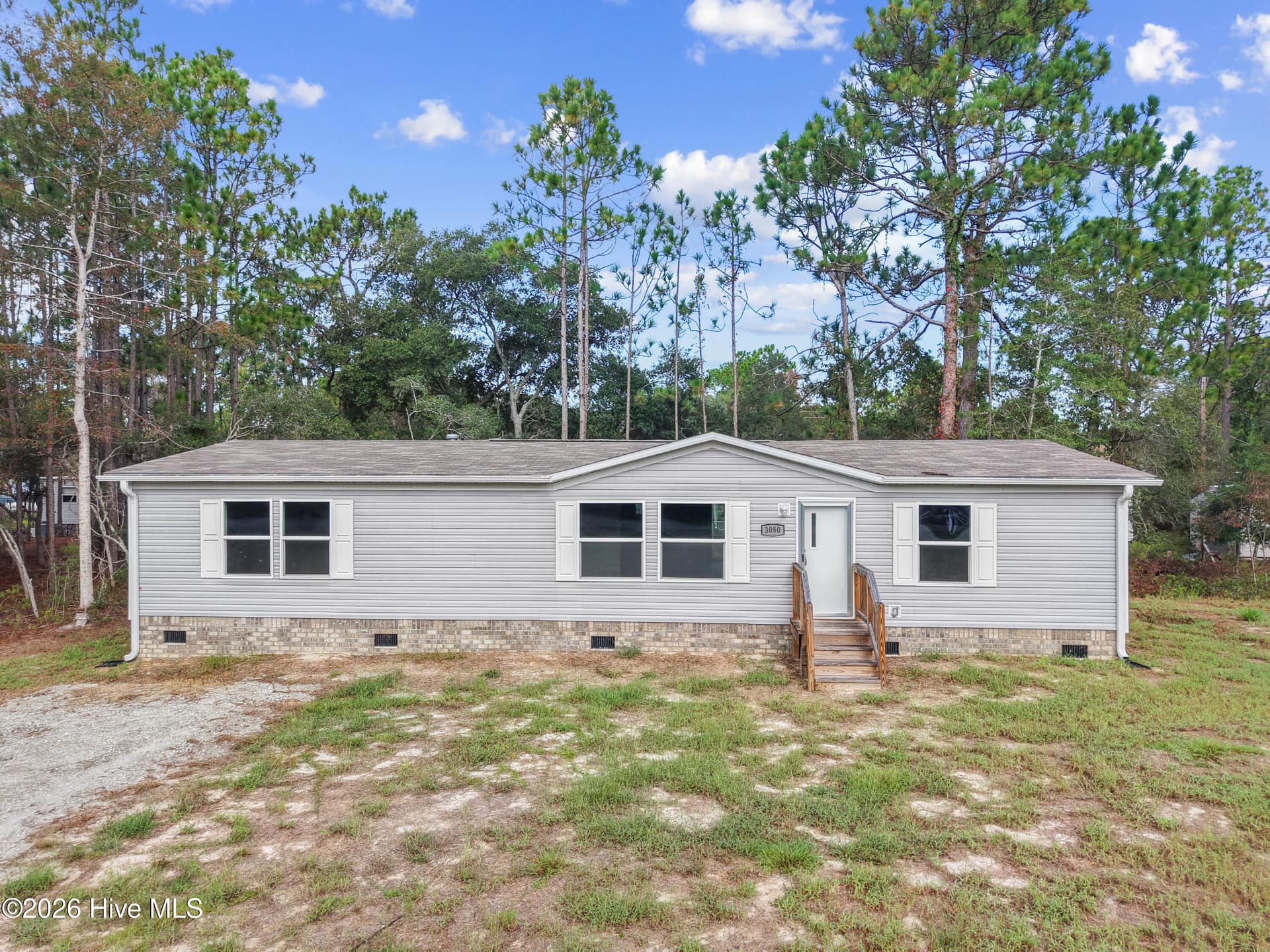 Manufactured Home at 3080 Cross Street SW, Shallotte, NC 28470, photo 2 of 35