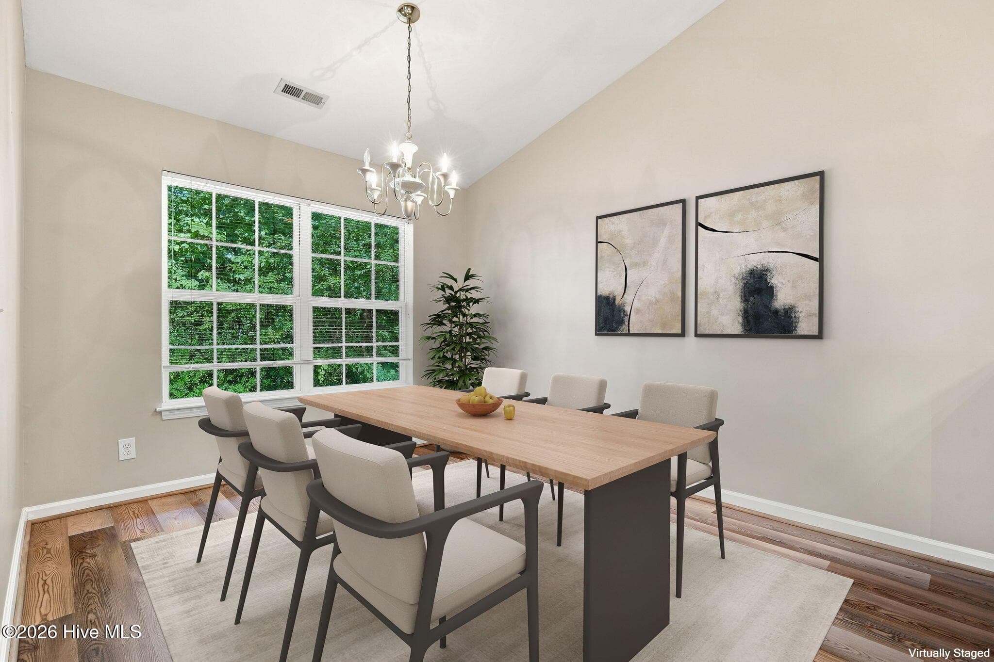 Virtually staged dining room - 2209 Locksley Woods Drive G, Greenville, NC 27858