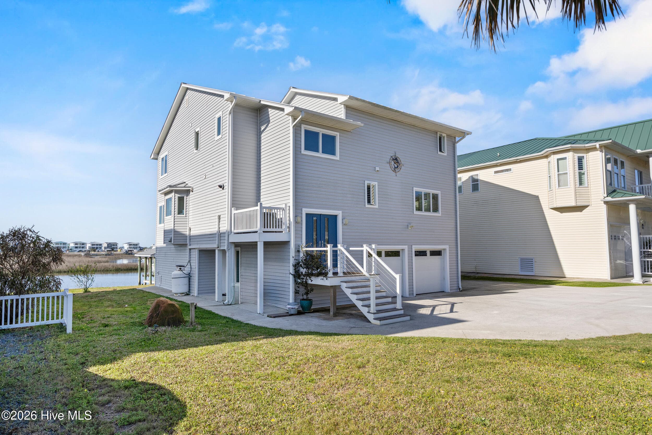 Single Family Residence at 103 E Island Drive, Oak Island, NC 28465, photo 108 of 118