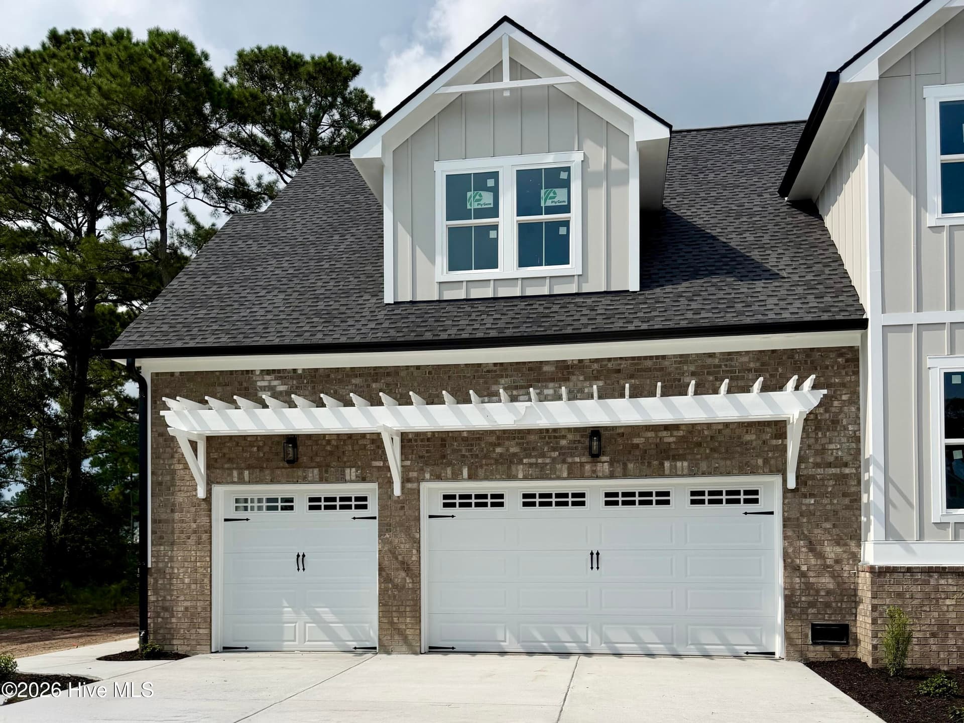 Three car garage, under construction. - 550 Glenburnie Street NW, Calabash, NC 28467
