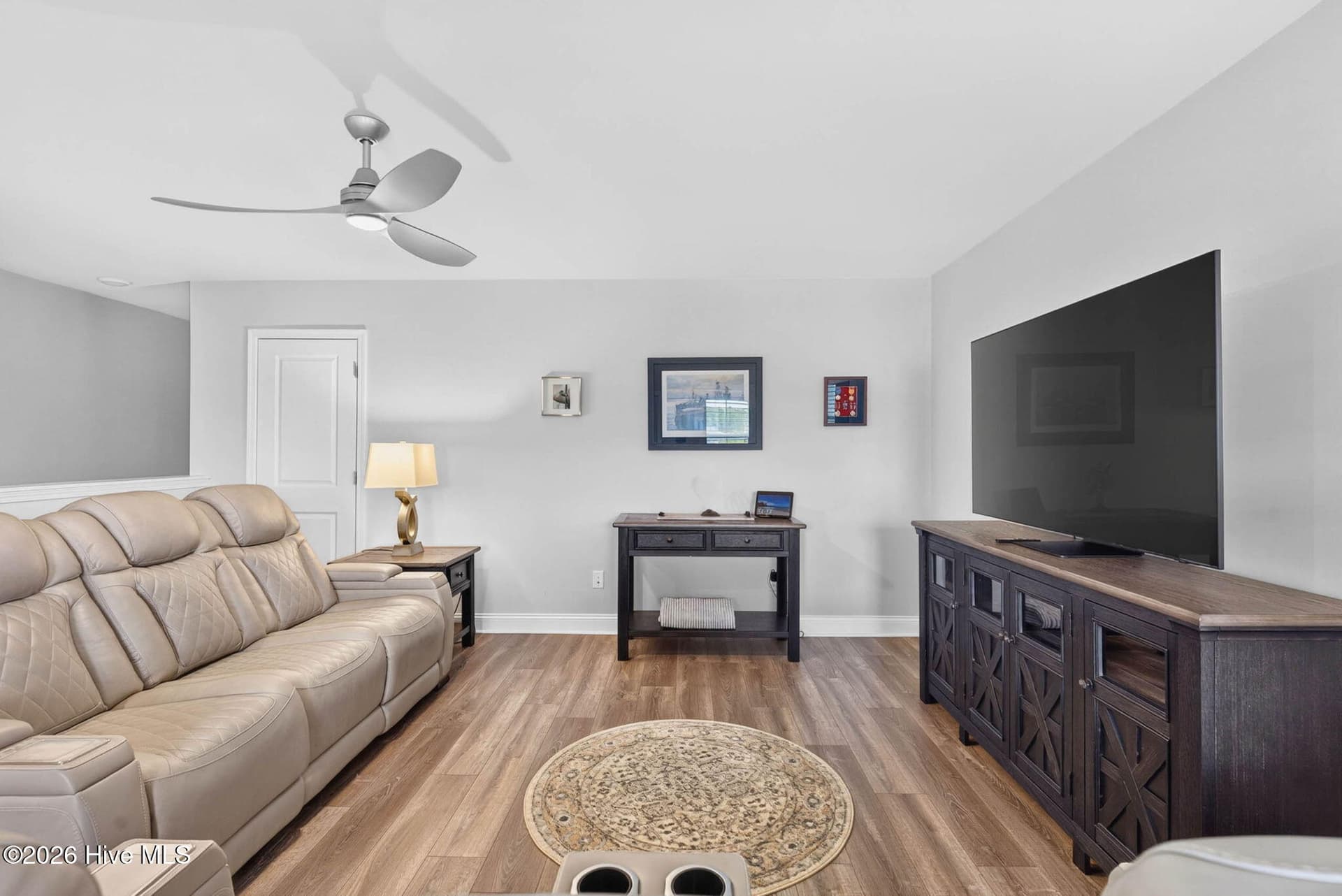The spacious upstairs loft provides an additional living area ideal for movie nights, gaming, or relaxing with guests. - 139 Eagle Claw Drive, Calabash, NC 28467