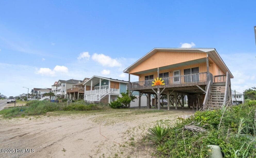Single Family Residence at 210 W Beach Drive, Oak Island, NC 28465, photo 2 of 42