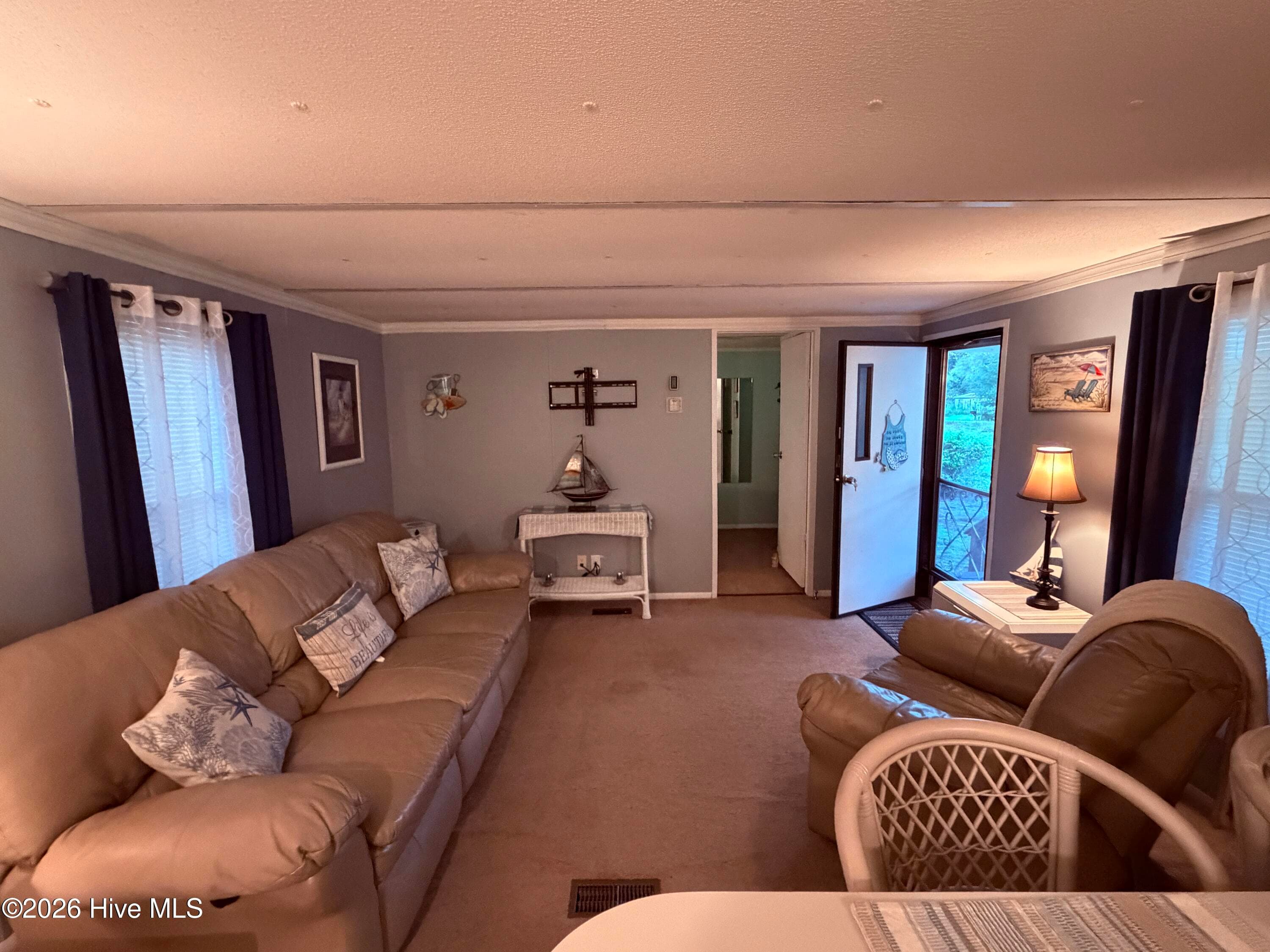 Manufactured Home at 1321 Caison Avenue SW, Supply, NC 28462, photo 3 of 5