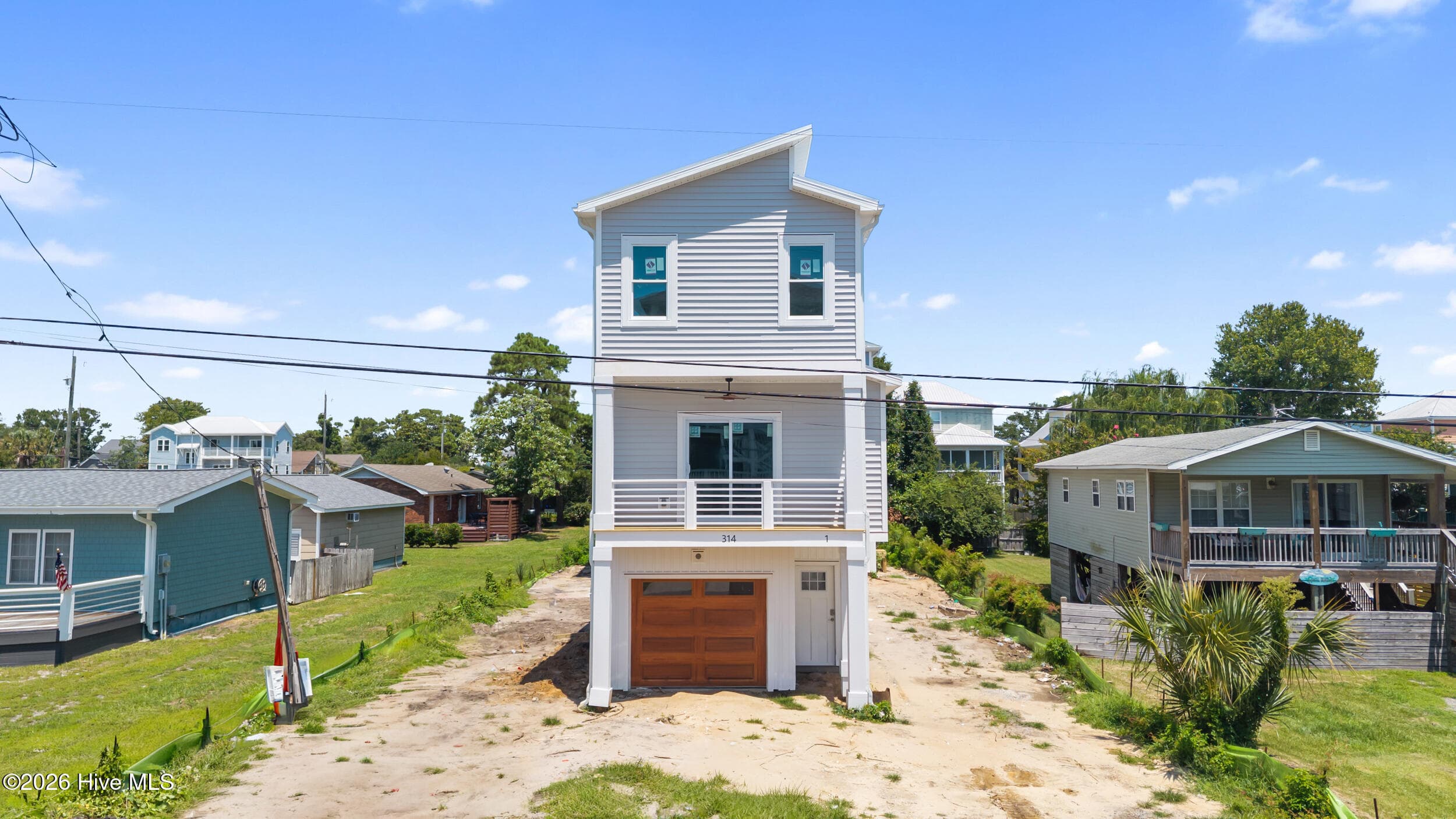 Townhouse at 314 Spartanburg Avenue Unit 1, Carolina Beach, NC 28428, photo 2 of 32