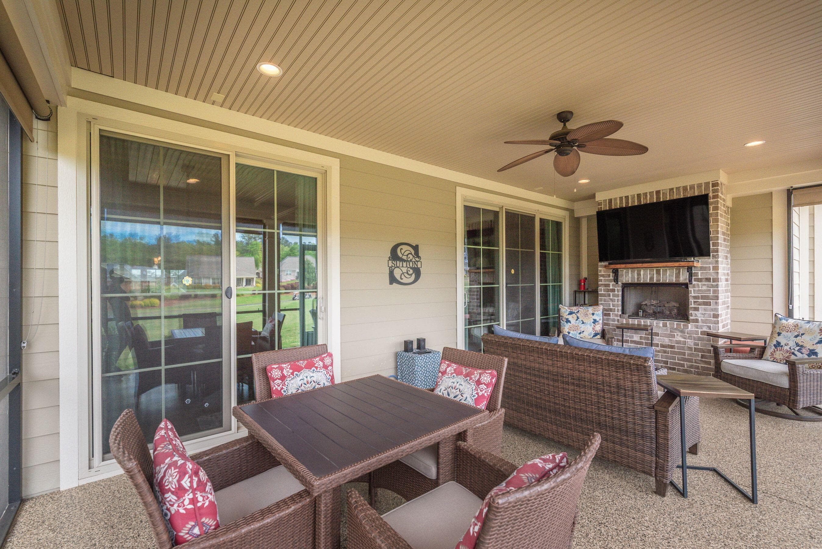 Screened porch with table - 207 Quiet Oak Court, Aiken, SC 29803