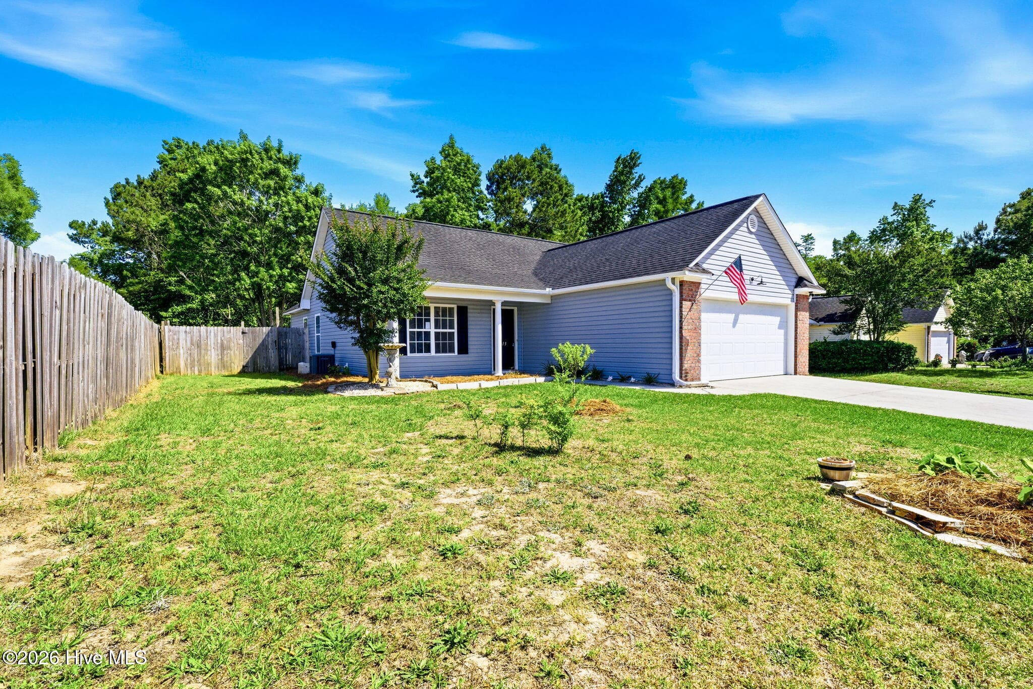 Left front elevation - 215 Gardenview Court NE, Leland, NC 28451