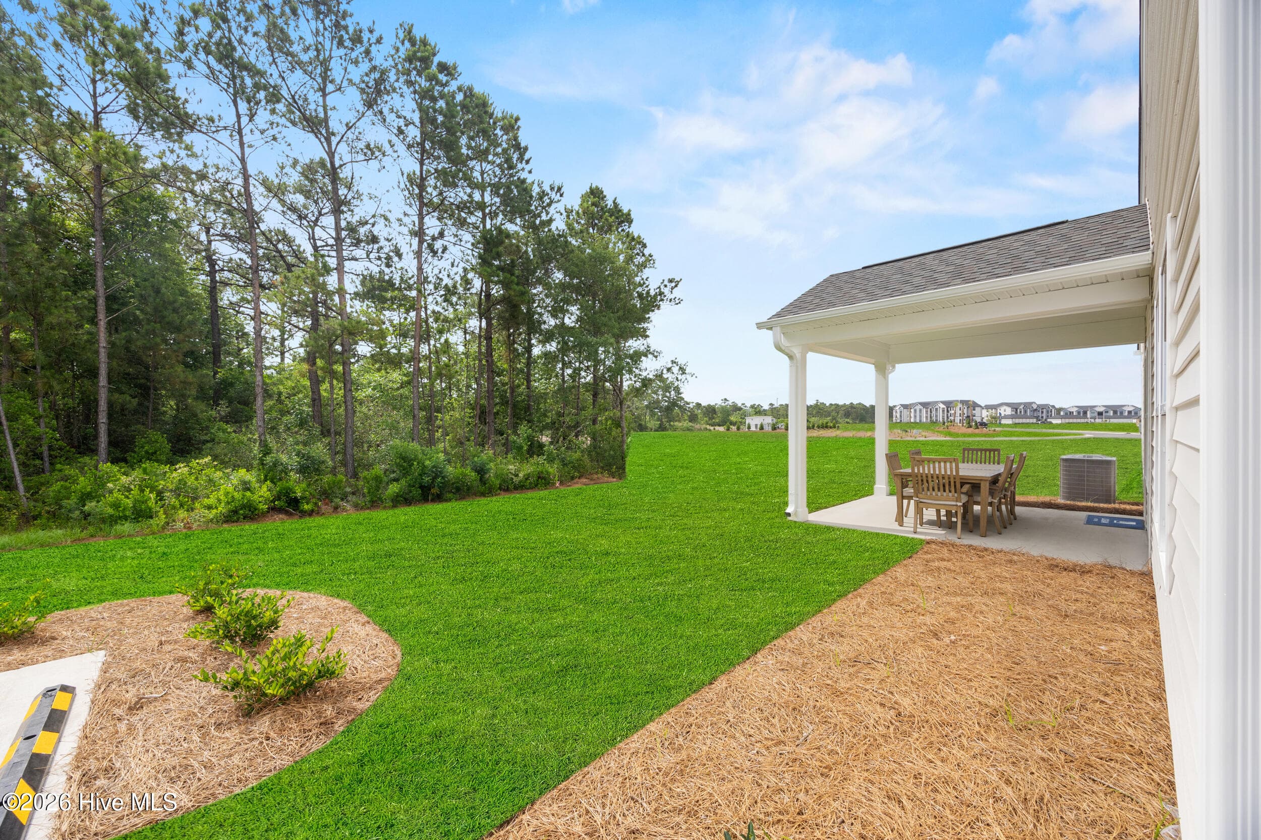 Home shown is a representation of the floor plan and may include optional features or upgrades. Elevations, materials, colors, finishes, square footage, and included features may vary from the actual home. Please consult a Sales Representative for complete details.
Public (Primary) - 629 Pelican Cove Way SE 247, Southport, NC 28461