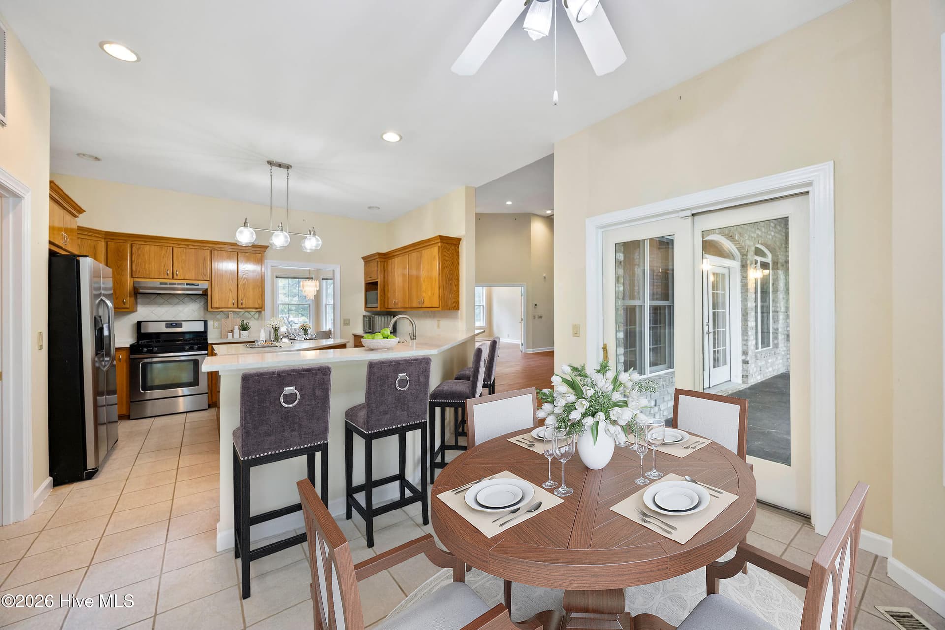 Breakfast Nook/ Kitchen virtual staging - 1834 Quail Point SE, Bolivia, NC 28422