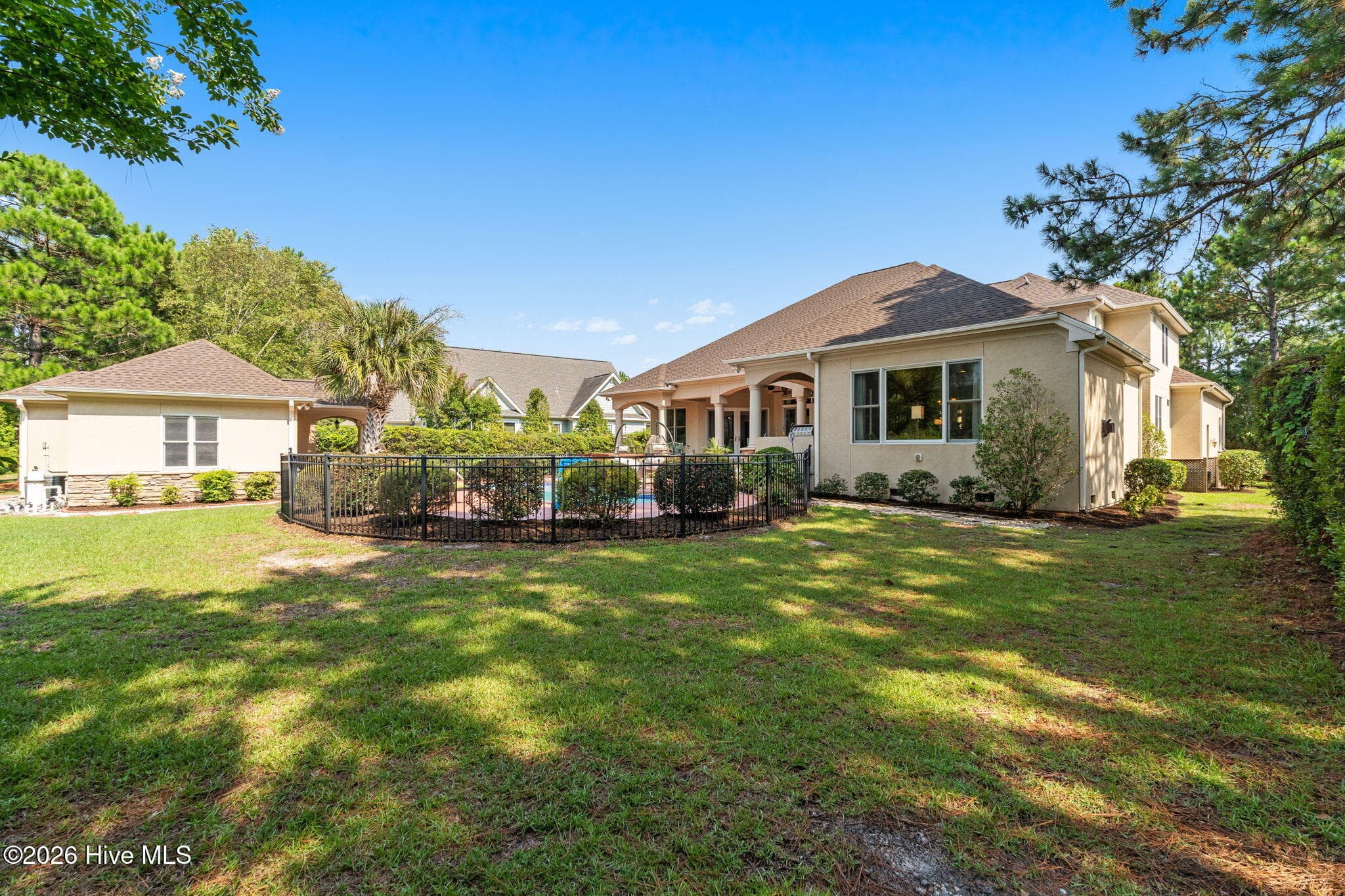 Spacious yard beyond the pool - 3858 Ridge Crest Drive, Southport, NC 28461