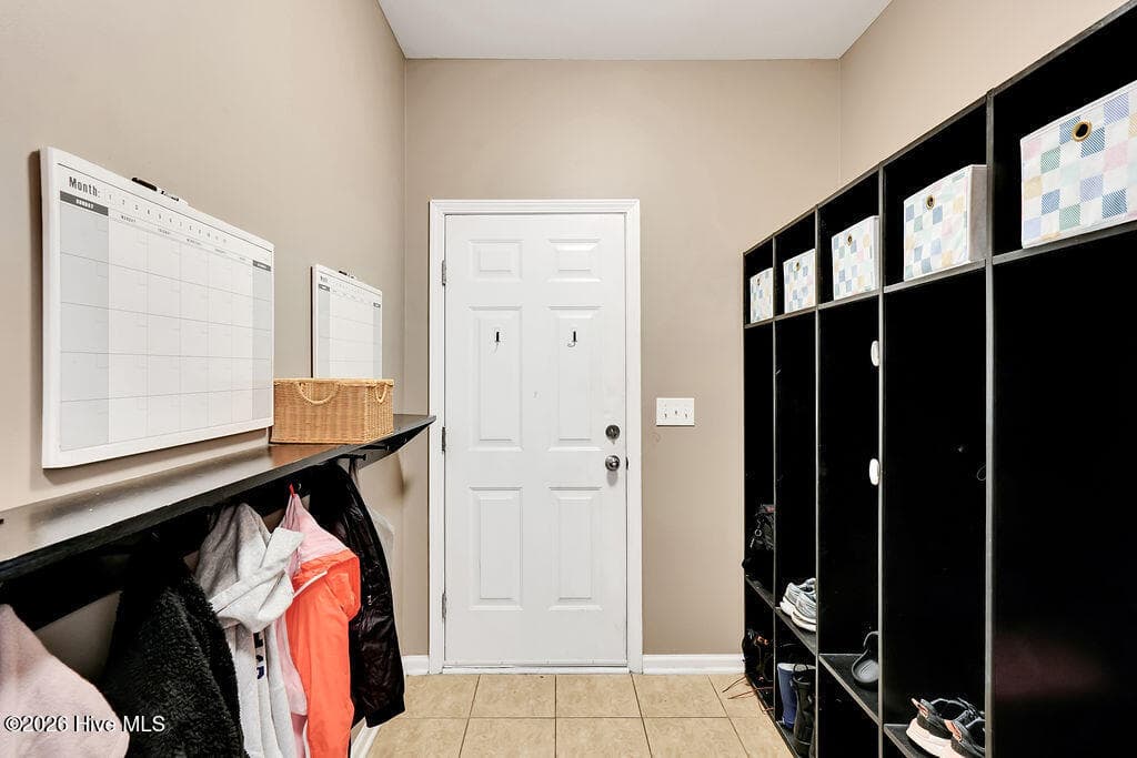 mudroom/cubby area coming in from the garage - 5010 Portside Drive, Southport, NC 28461