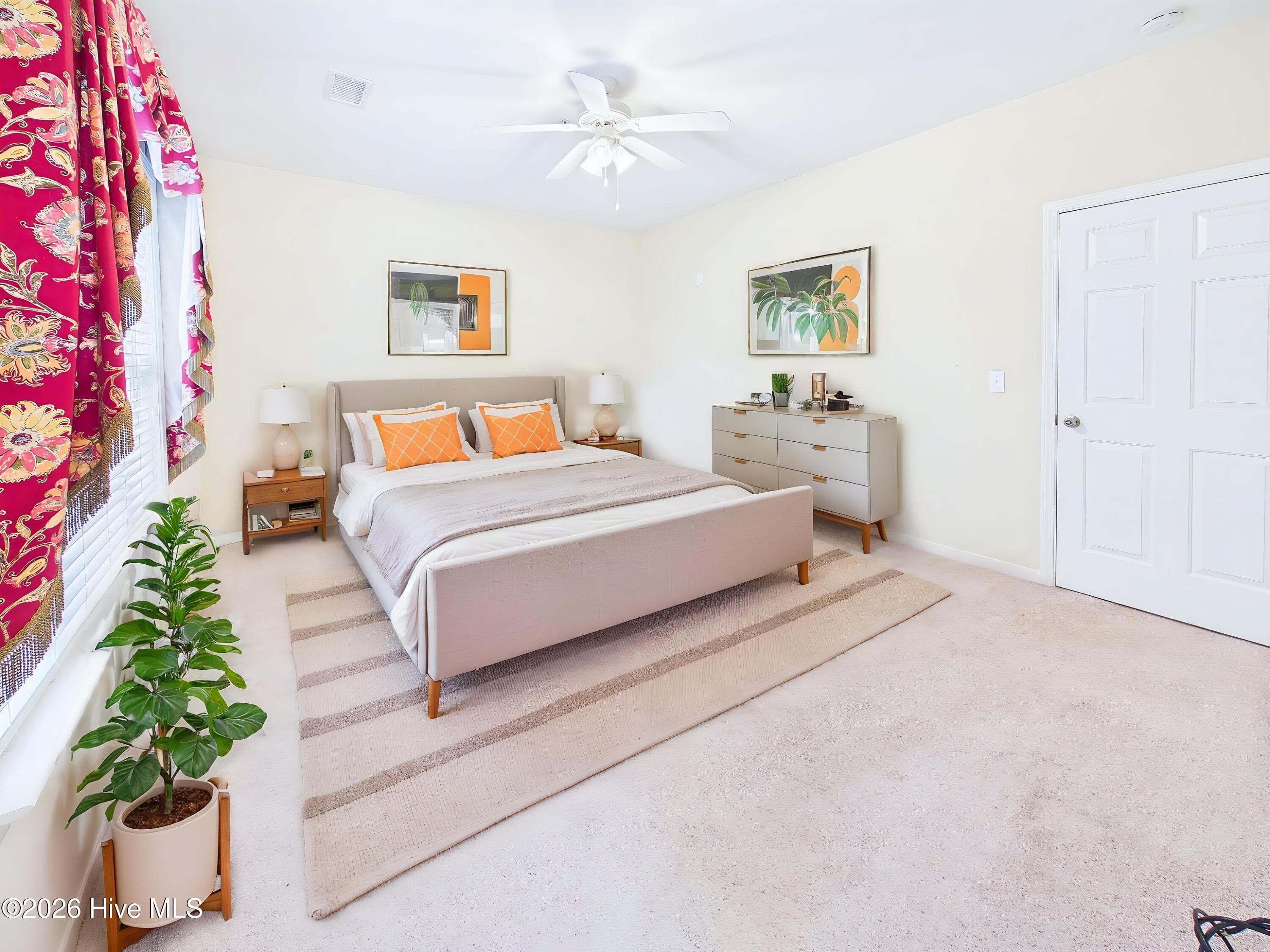 Virtually staged - primary bedroom - 3909 Botsford Court Unit 103, Wilmington, NC 28412