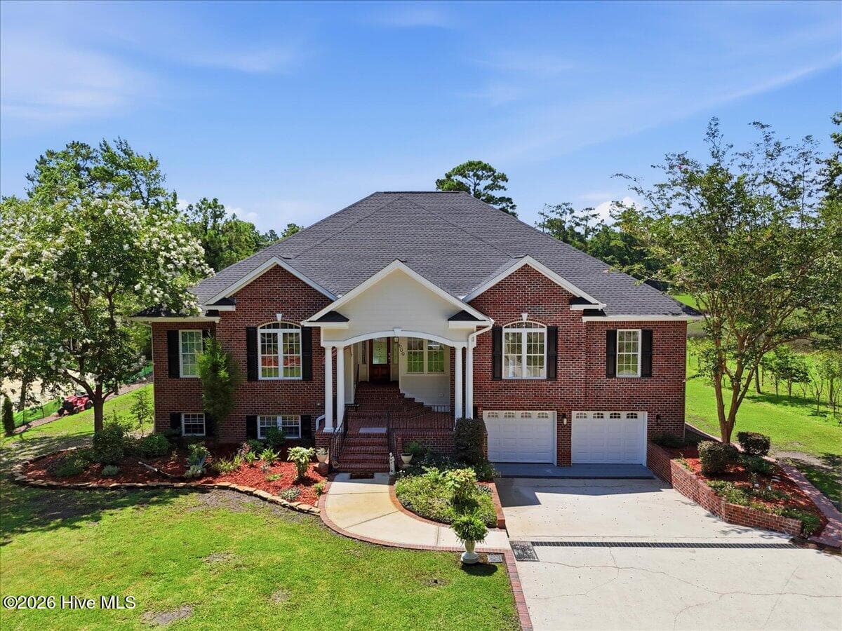 Single Family Residence at 609 Sawgrass Road, Hampstead, NC 28443, photo 7 of 105