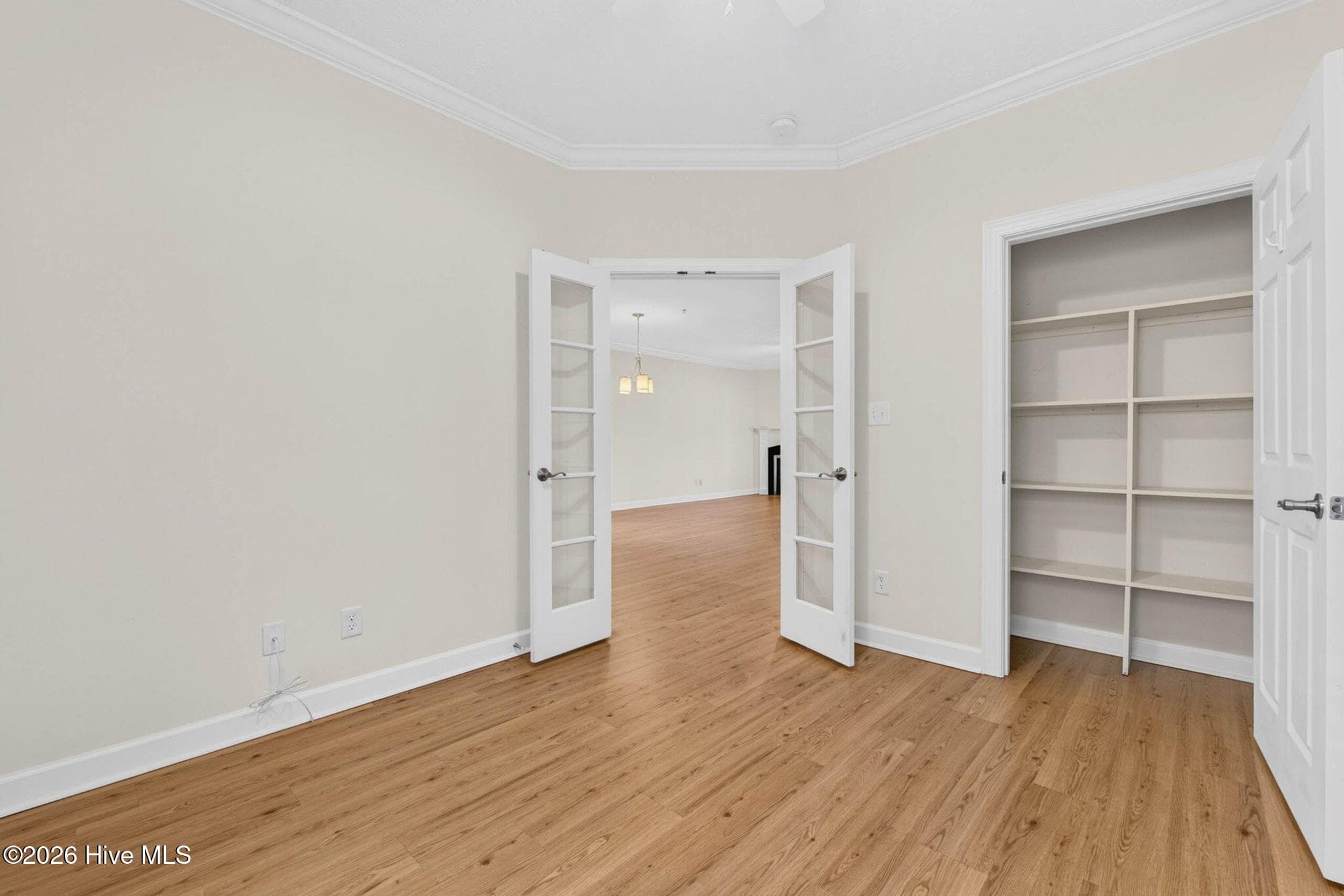 Third bedroom showing closet - 7825 High Market Street #303, Sunset Beach, NC 28468