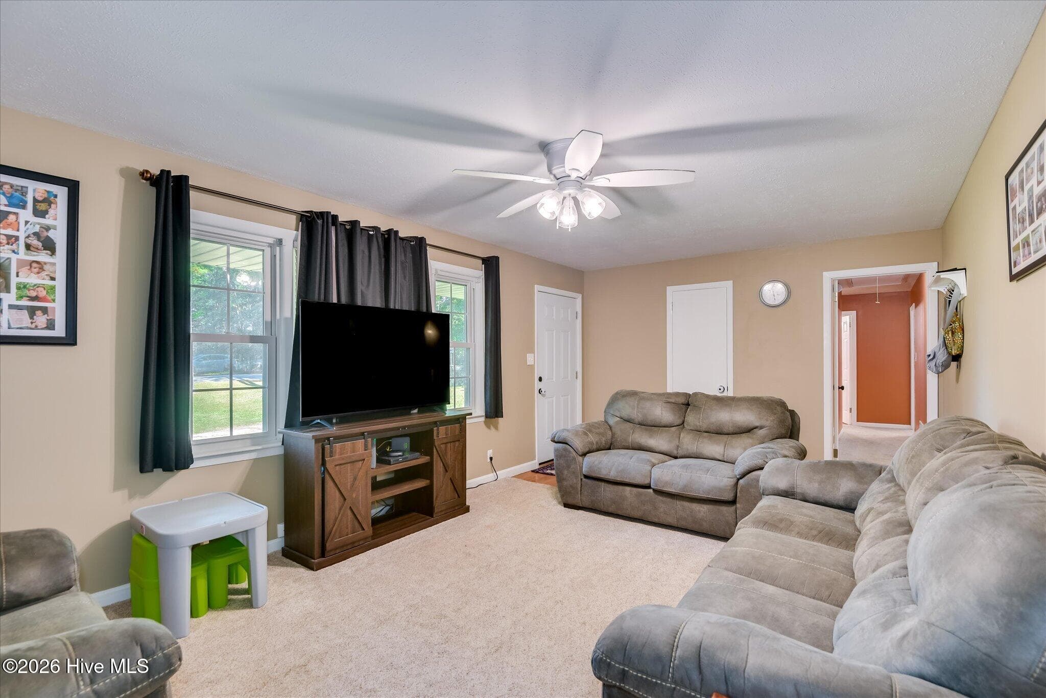 Area rug in photo can be removed to reveal original hardwood floors throughout the home! - 1445 Pine Log Road, Aiken, SC 29803