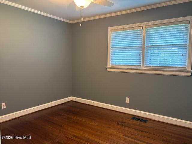 bed 1 hardwood floors- windows positioned nicely for furniture placement - 3108 Amherst Road, Rocky Mount, NC 27804