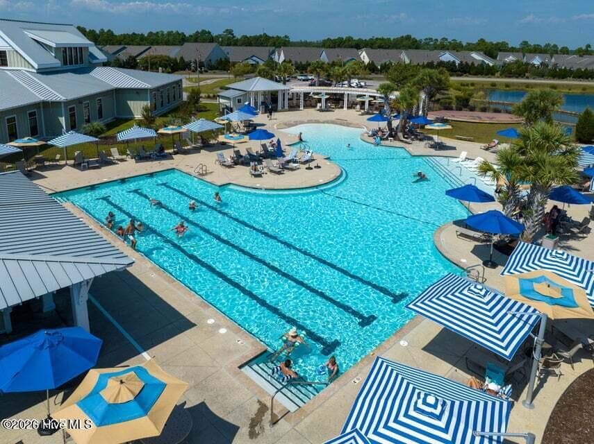 One of 3 outdoor pools in the community - 2775 Long Bay Drive SE, Southport, NC 28461