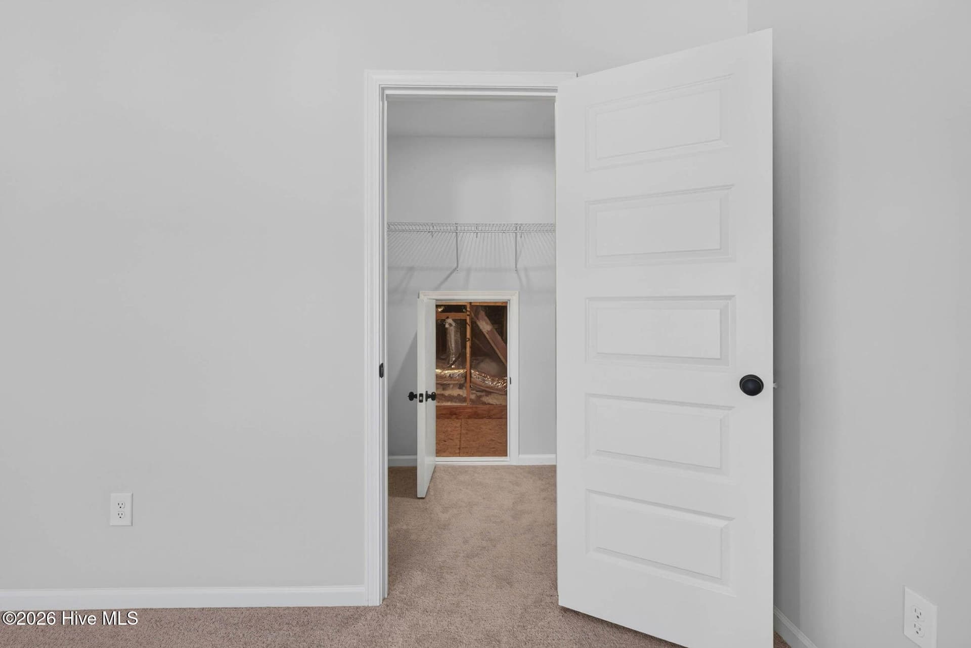 Upstairs guest suite entrance with access to the adjoining bathroom. - 3447 Sandhill Crane Drive SW, Ocean Isle Beach, NC 28469