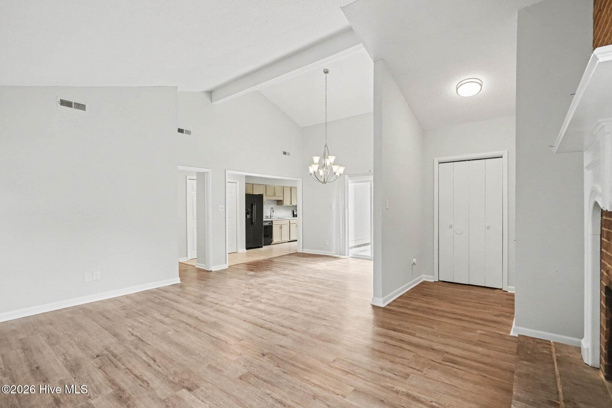Seamless flow from the entryway, with view of the coat closet, into the family room, dining area and kitchen beyond making this an ideal layout for every day living and enteraining. - 108 Deerfield Drive, Spring Lake, NC 28390