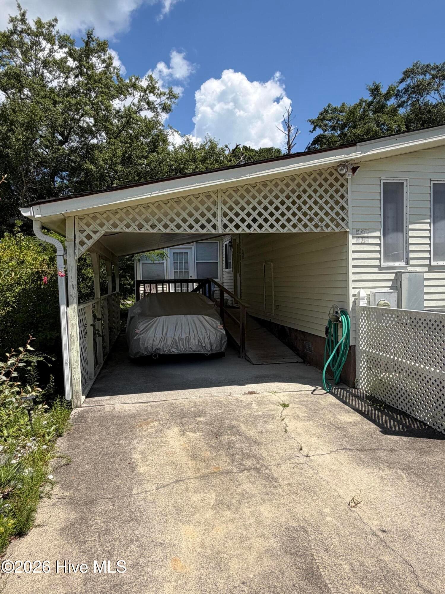 carport/street view - 606 Galley Court, Hampstead, NC 28443