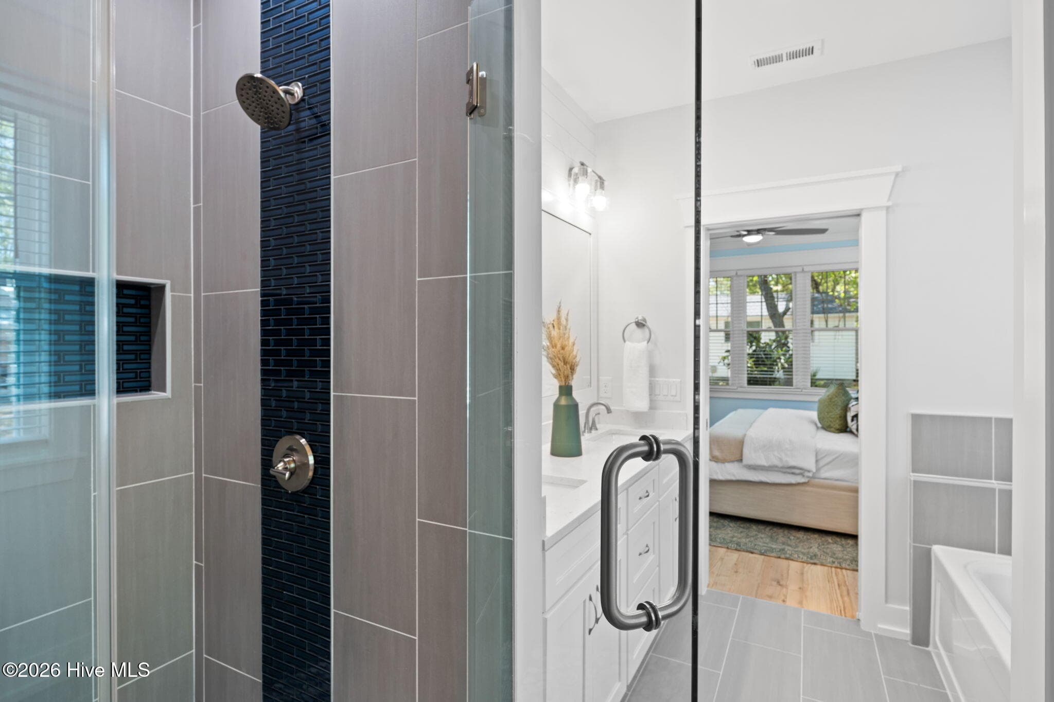 Photos of a staged model of the exact same plan - 312 NE 58th Street, Oak Island, NC 28465