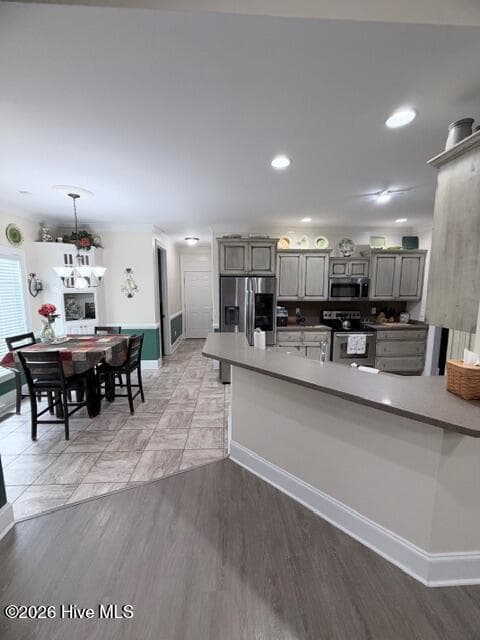 View from Great Room to Breakfast Nook & Kitchen - 138 Trestle Street, Hamlet, NC 28345