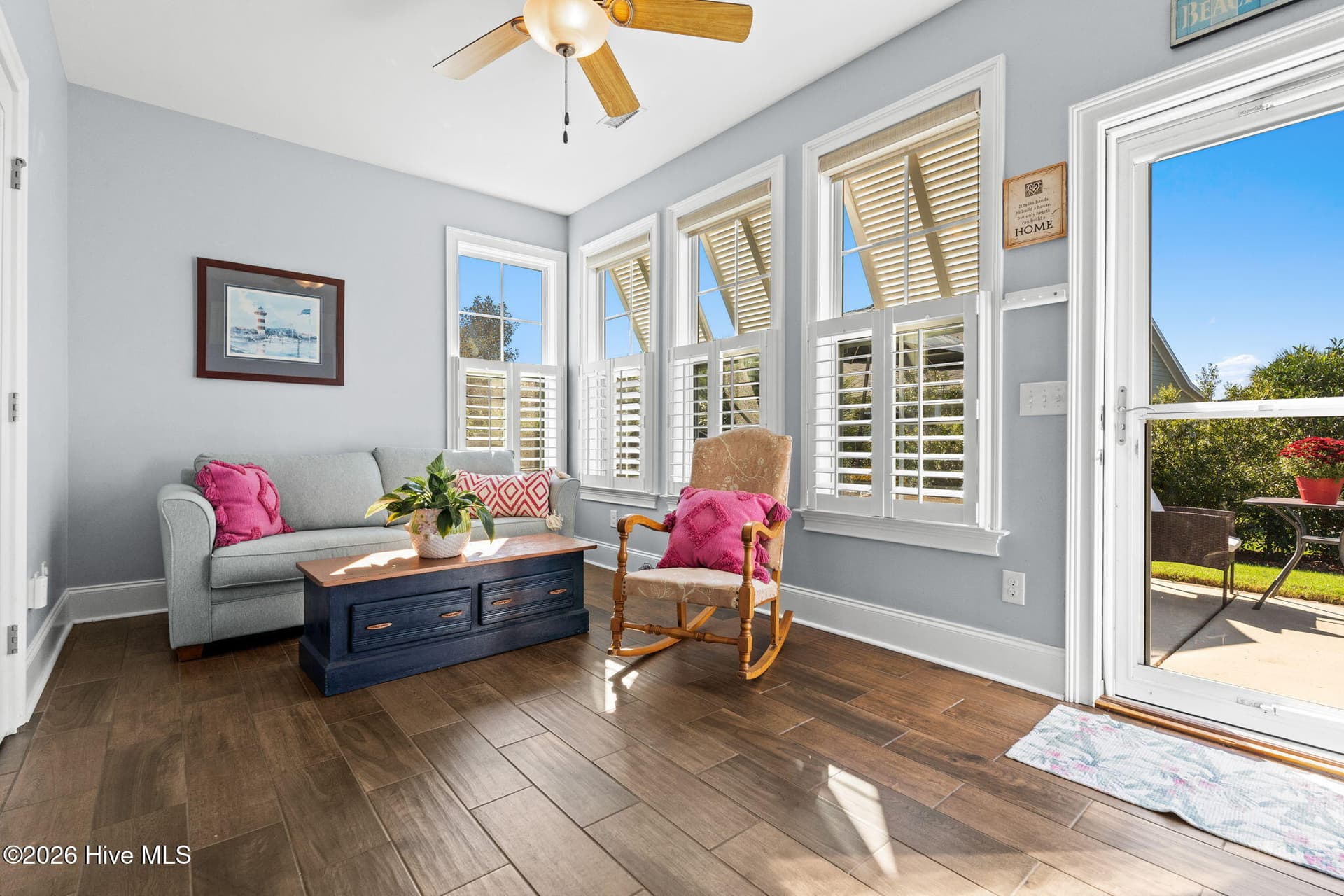 Plantation shutters with shades and Bahama exterior shutters - 6363 Havencrest Drive SW, Ocean Isle Beach, NC 28469