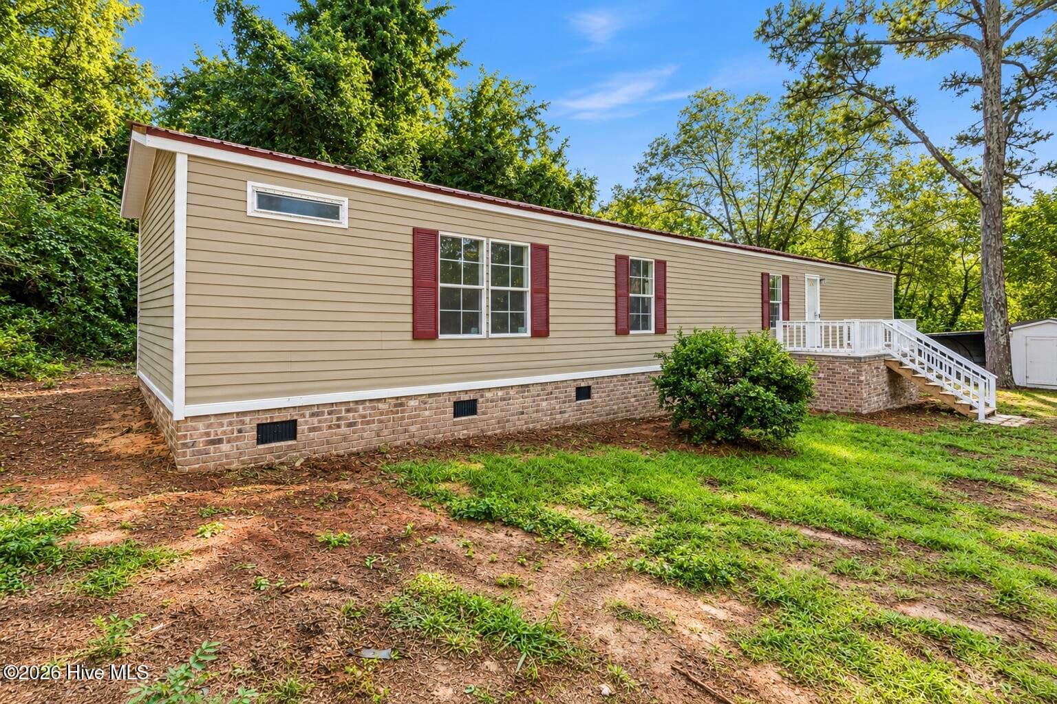 Manufactured Home at 1216 Roberdel Road, Rockingham, NC 28379, photo 4 of 24